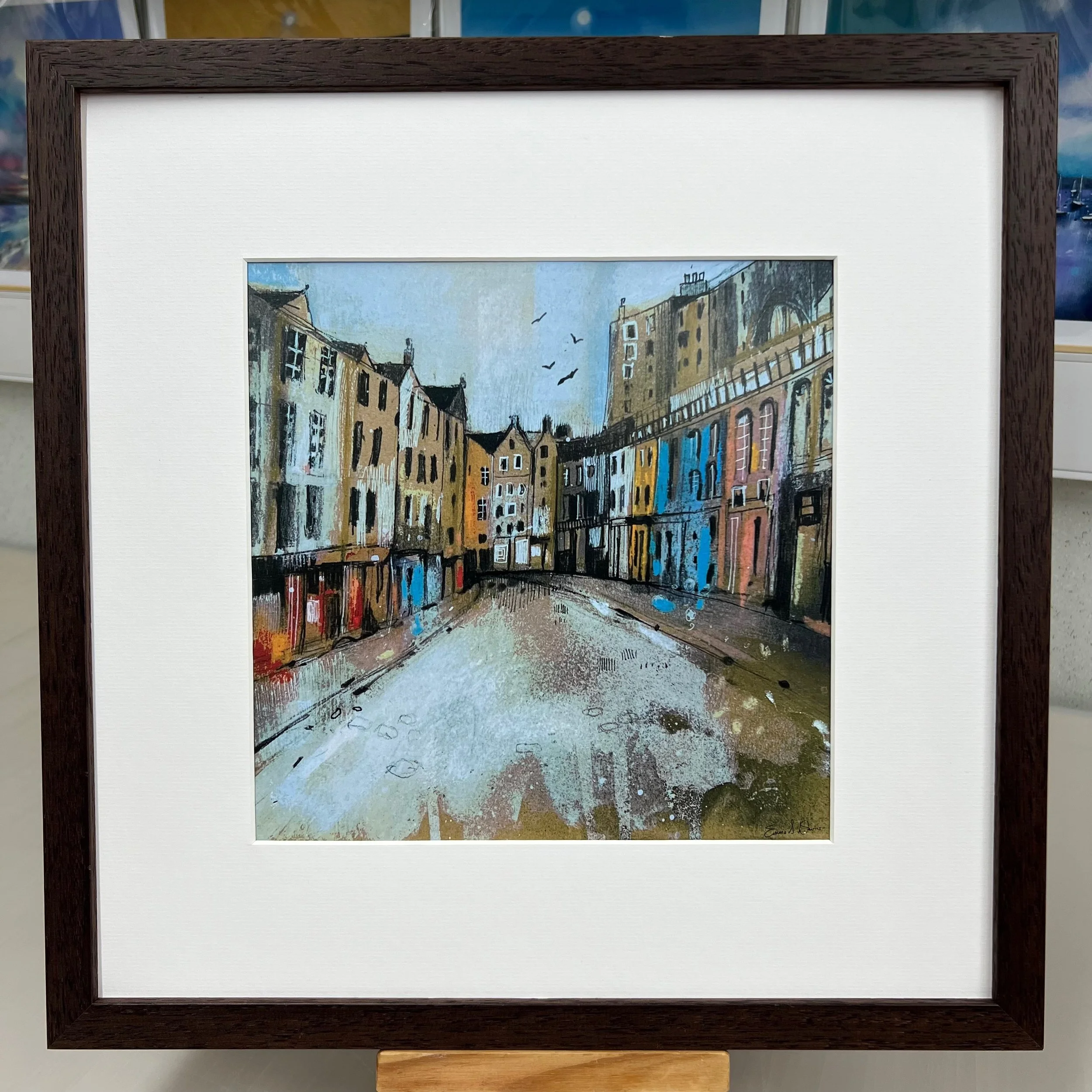 Victoria Street, Edinburgh - inspiration for Harry Potter's Diagon Alley in Emma S Davis Artist's open edition art print framed brown.