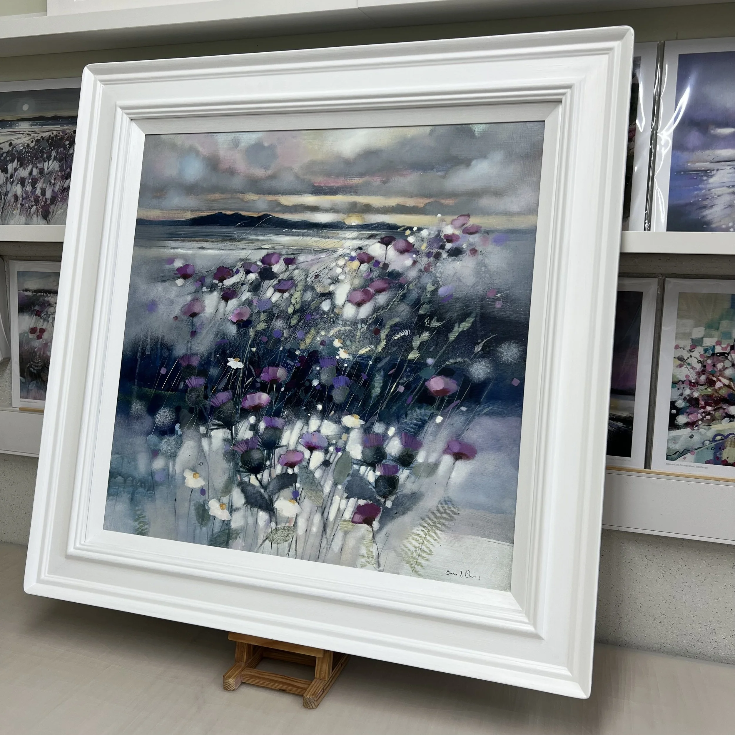 Framed Scottish landscape painting Sunset Thistles and Arran featuring the Isle of Arran and coastal wildflowers. Alternate view.