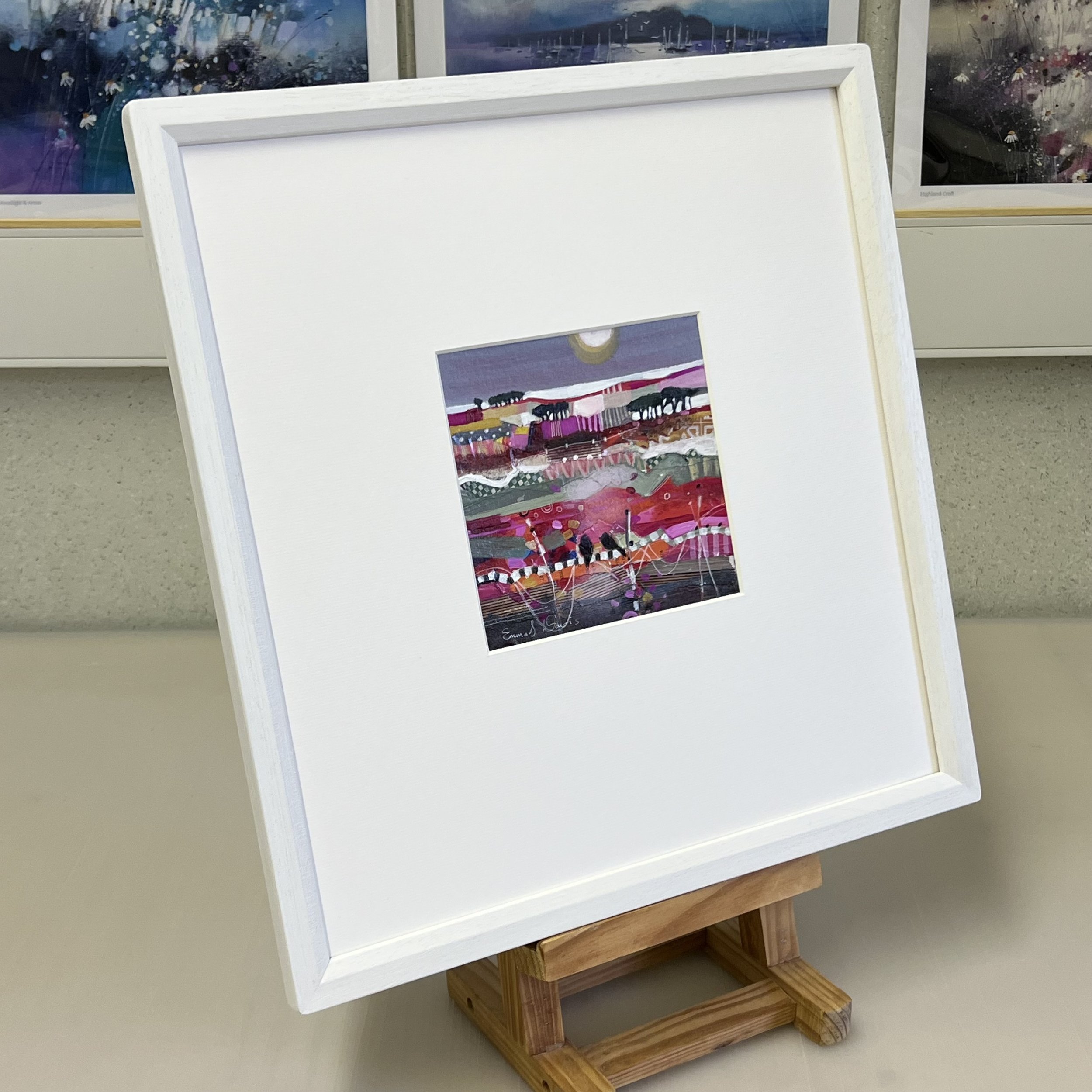 Colours of Autumn by Emma S Davis Artist, a framed abstract small original painting displaying fields of autumnal colours under a moonlit sky.