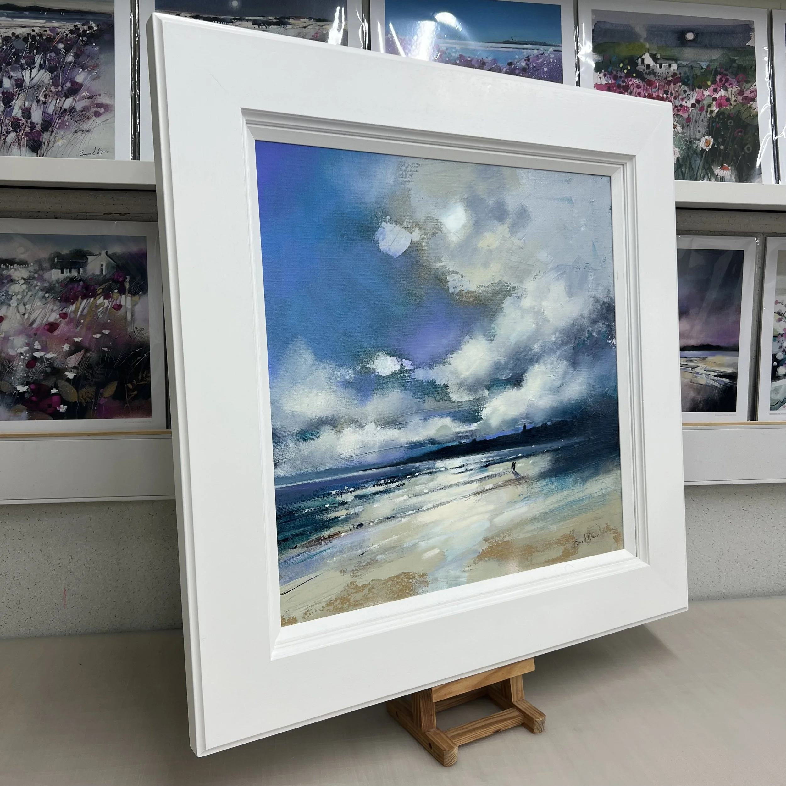 Tide’s Out, West Sands, St Andrews by Emma S Davis – original oil painting of West Sands beach with dramatic skies and two figures walking along the shoreline. Side view.