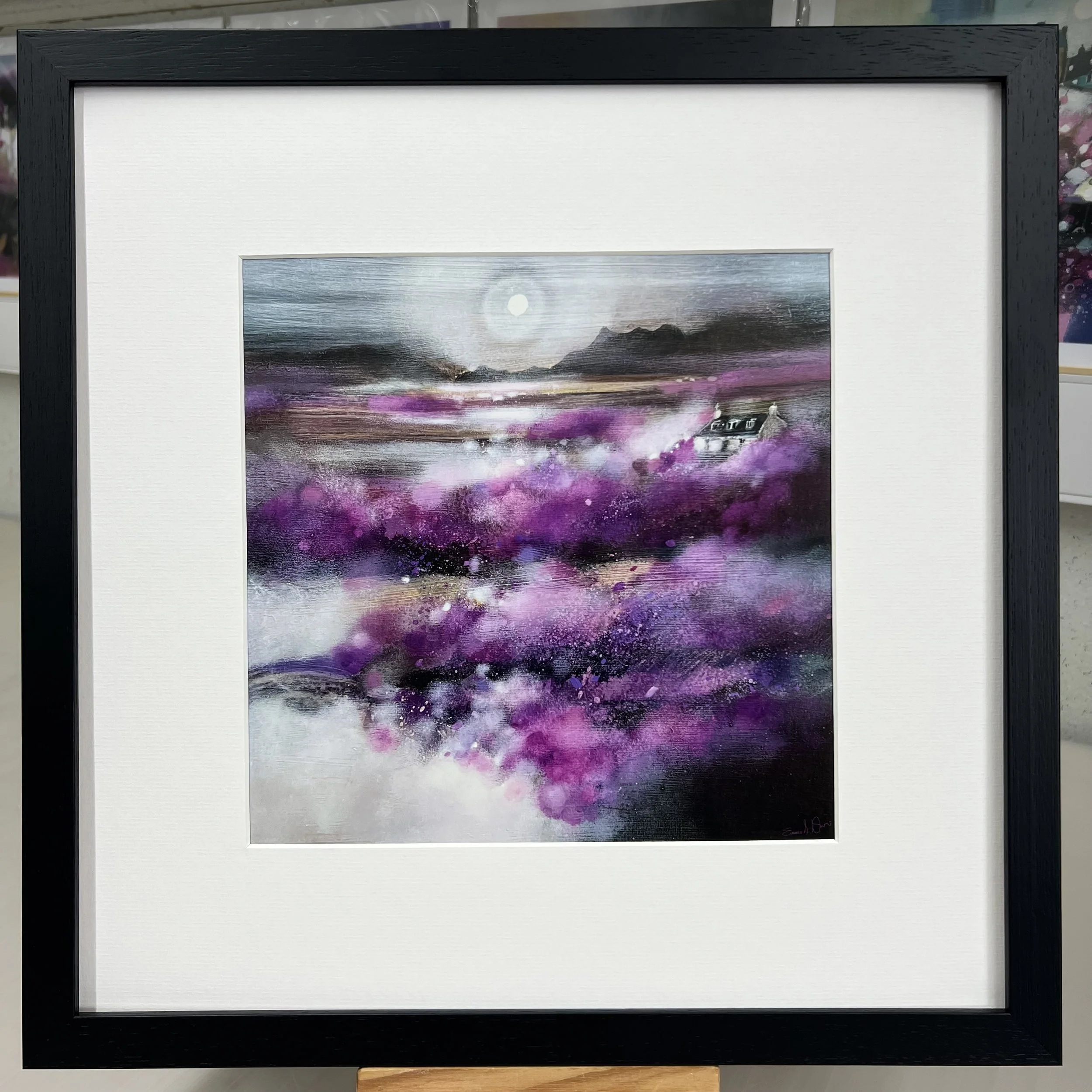 Isle of Skye Heather Scottish landscape artwork featuring purple heather inspired by the Isle of Skye by Emma S Davis Artist. Black frame.