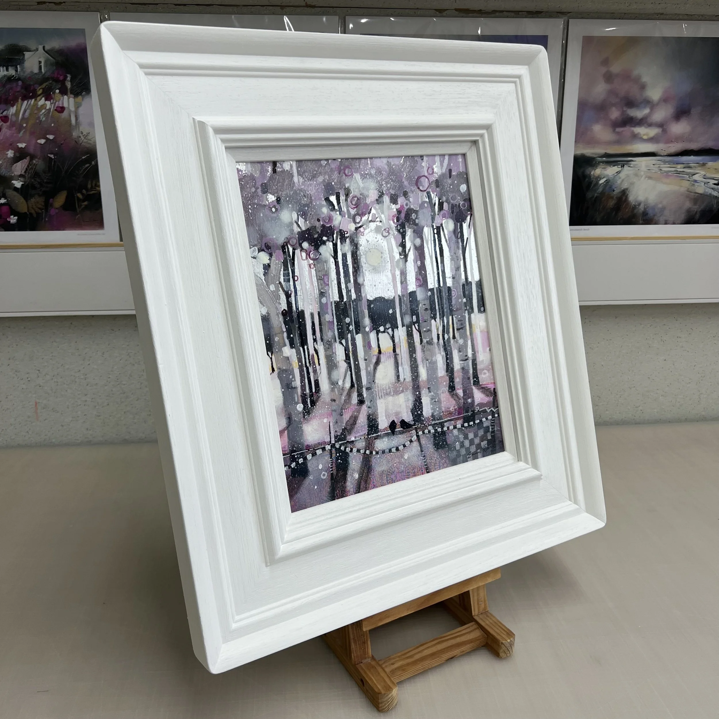 Framed woodland moonlight painting Forever Entwined by Emma S Davis. Side view.