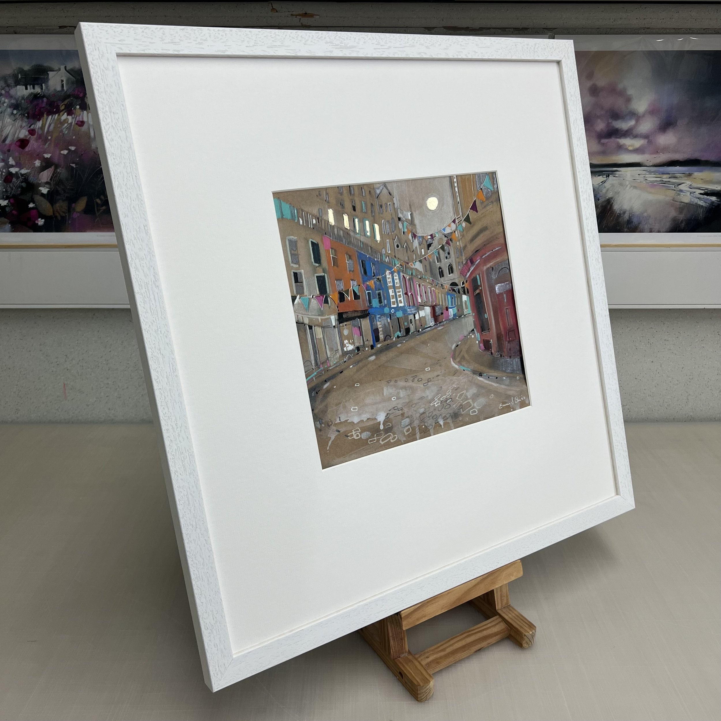 Bunting, Victoria Street, Edinburgh by Emma S Davis – original mixed media artwork featuring colourful bunting and the famous curved street in Edinburgh’s Old Town. Side view.