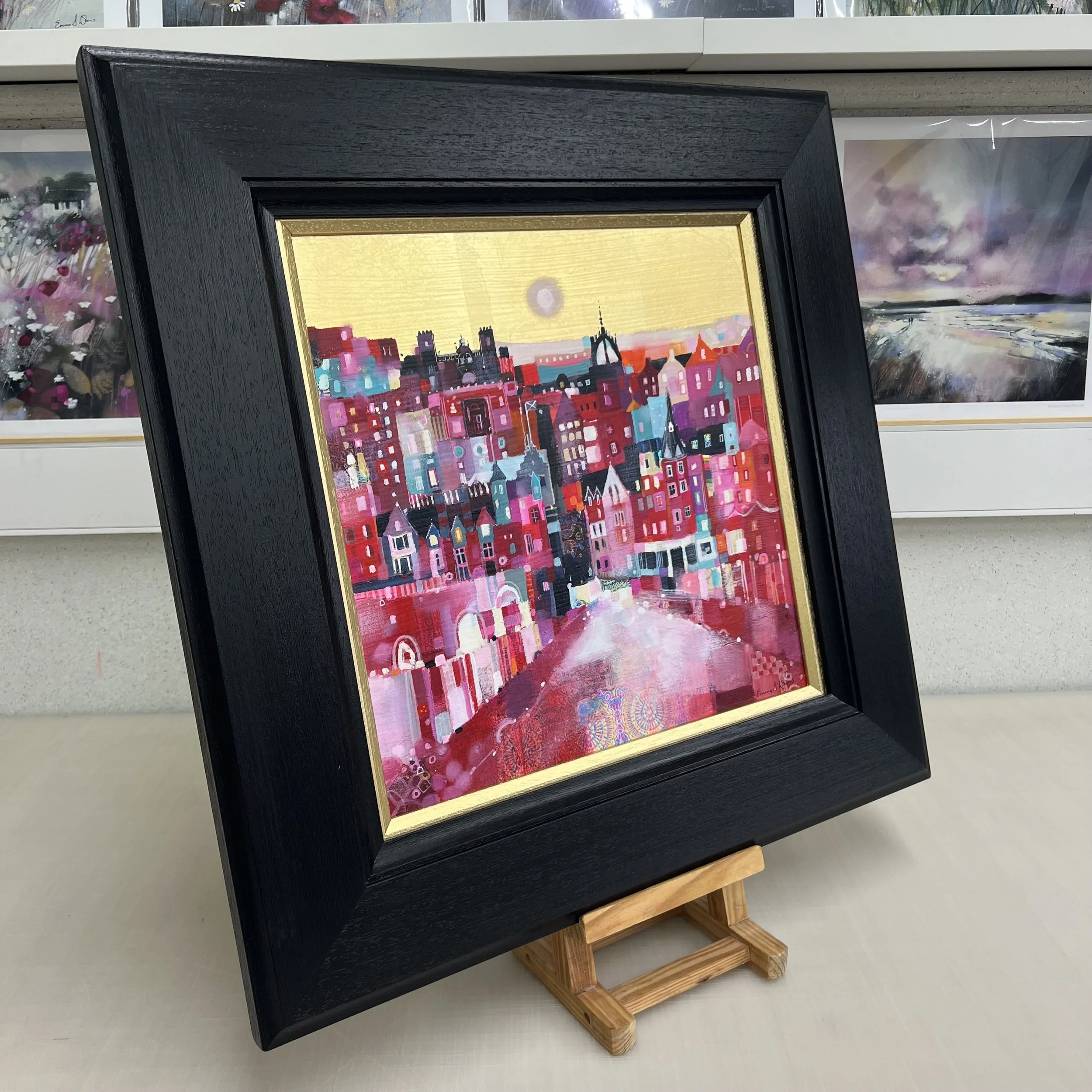 Original oil painting with gold leaf of Edinburgh’s Old Town with colourful buildings, spires and rooftops by Scottish artist Emma S Davis. Side view.