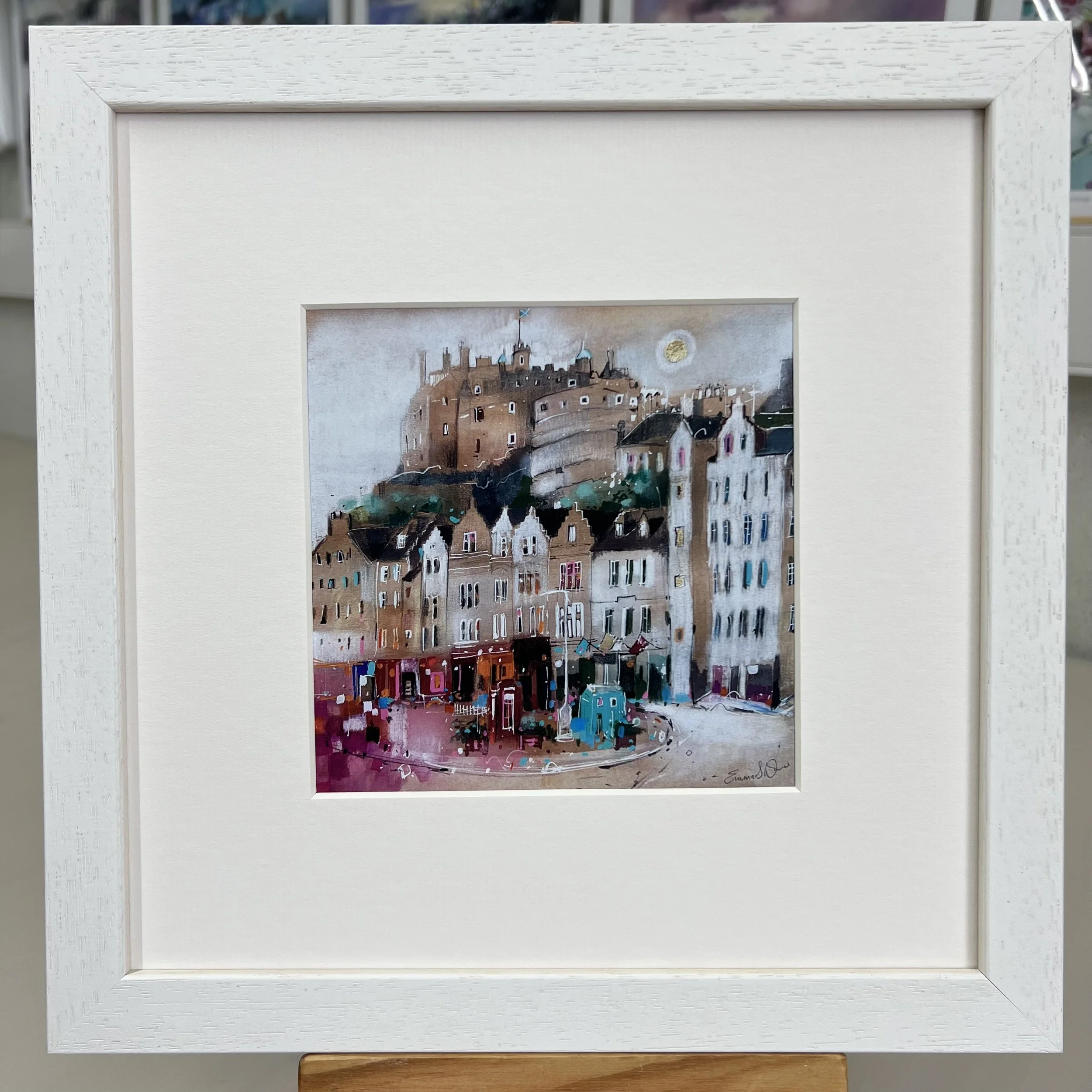 Moonlight Grassmarket Edinburgh framed art card featuring Edinburgh Castle overlooking the historic Grassmarket area of Edinburgh. Framed white single mount.