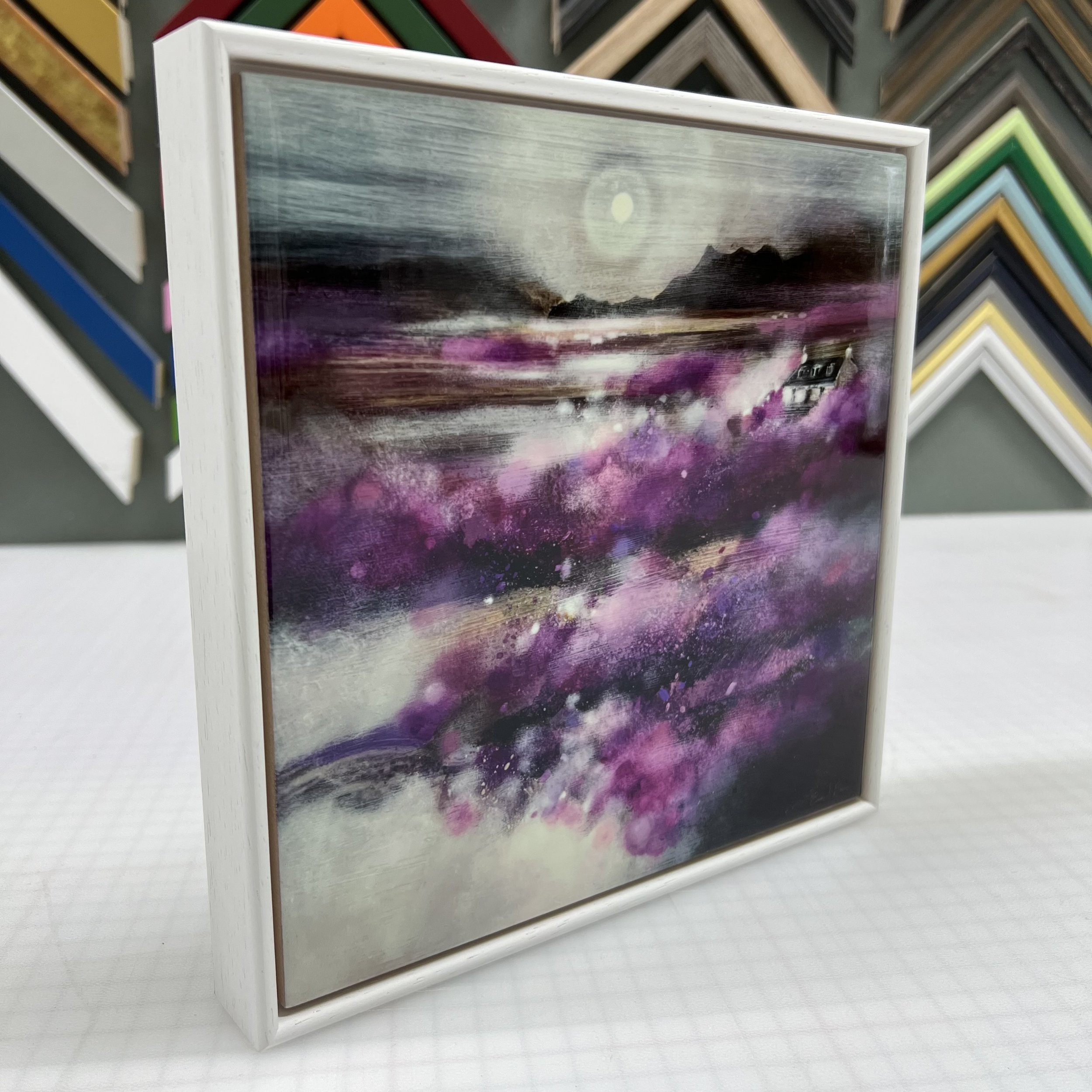 Isle of Skye Heather Scottish landscape framed ceramic tile featuring purple heather inspired by the Isle of Skye by Emma S Davis Artist. Side view.