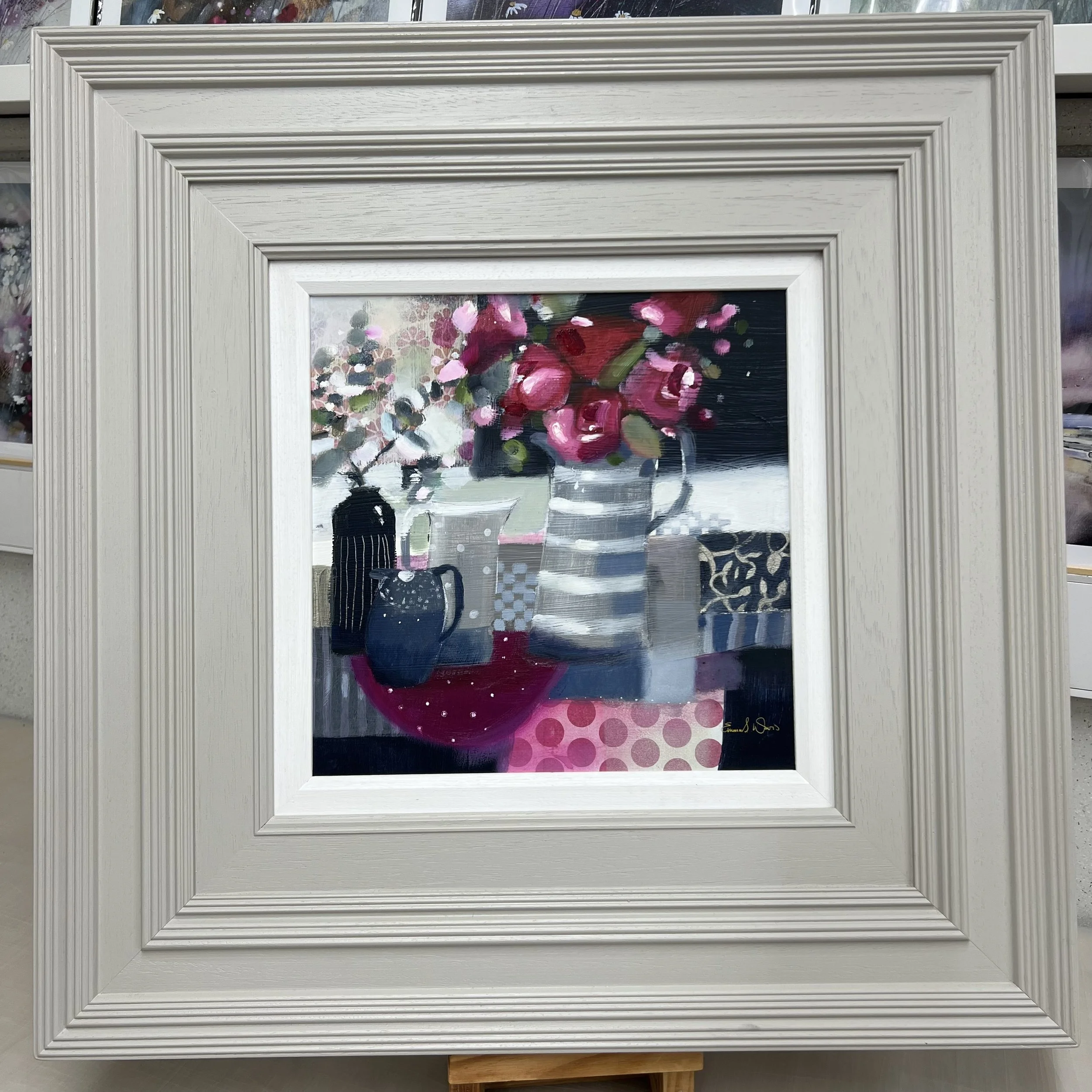Always and Forever original mixed media floral still life painting by Scottish artist Emma S Davis featuring contemporary ceramic vessels and pink flowers. Framed view.