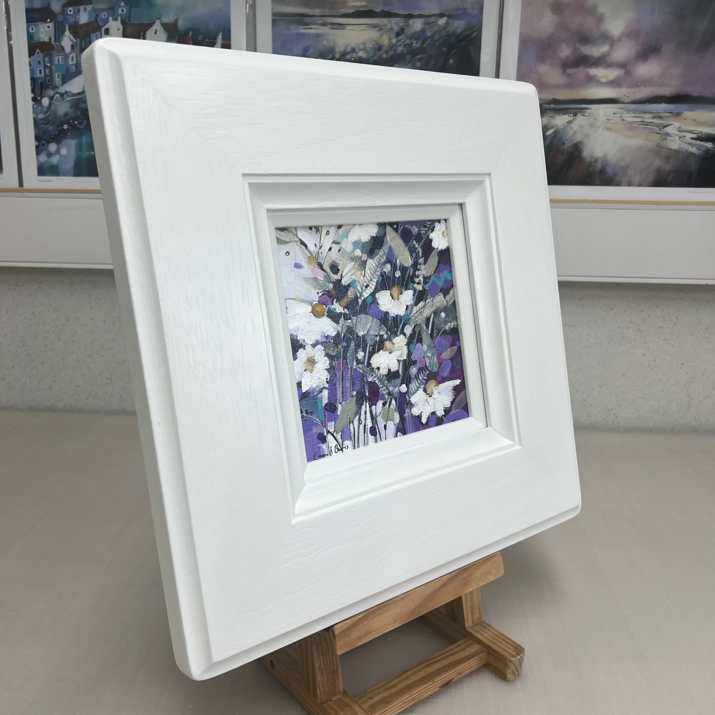 Original painting of bees at work amongst daisies and other wildflowers by Emma S Davis Artist. Side view.