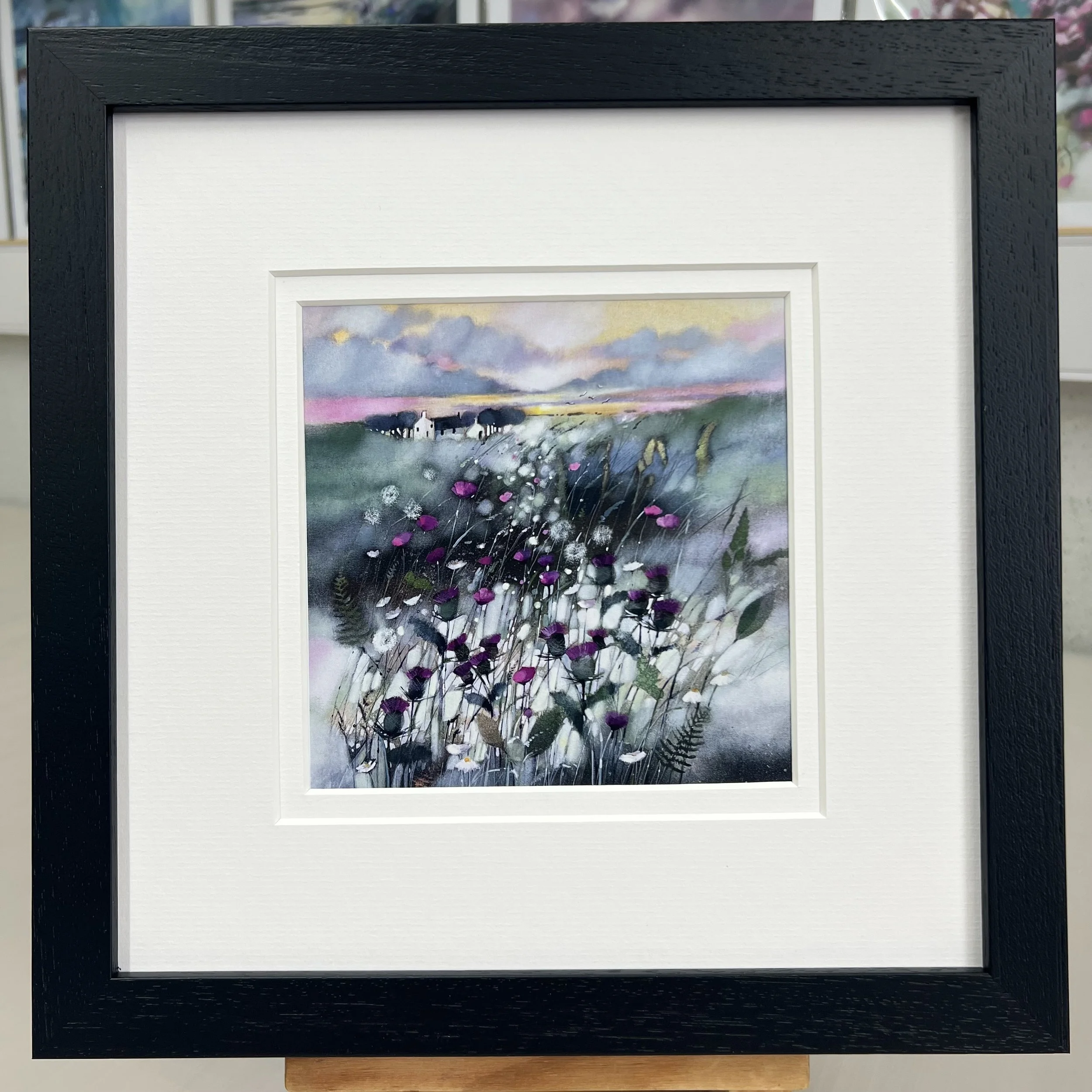 Framed Art Card The Thistle, Flower of Scotland by Scottish Landscape Artist Emma S Davis. Black Frame Double Mount