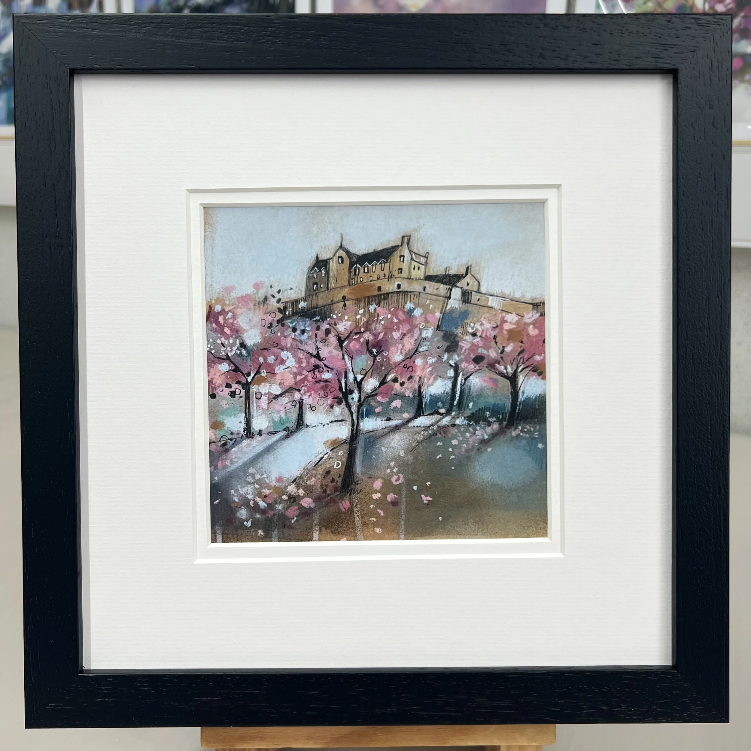 Framed Art Card Edinburgh Castle & Princes Street Gardens by Scottish Landscape Artist Emma S Davis. Black Frame Double Mount