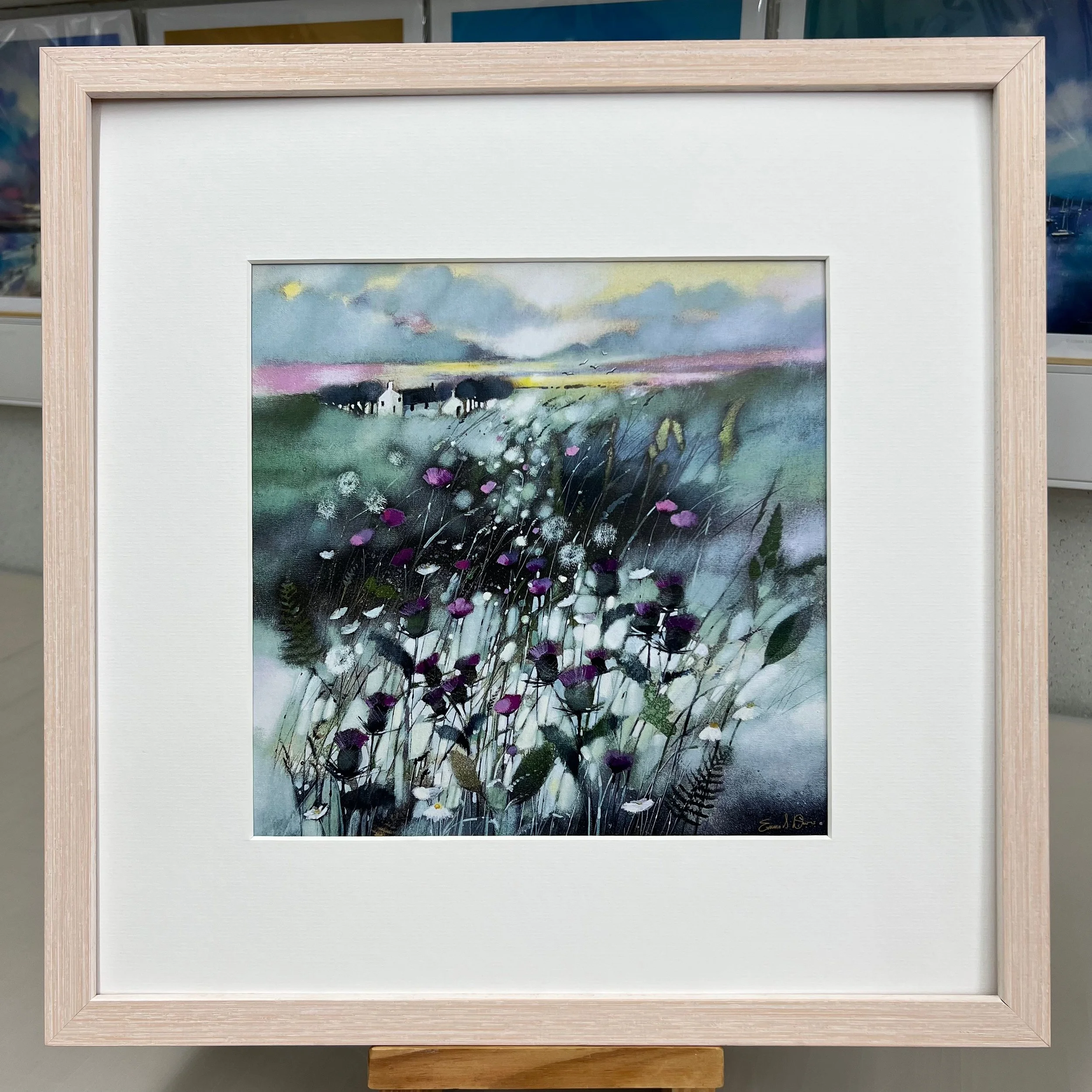 tThe thistle, Scotland's national flower, dominates the landscape in Emma S Davis Artist's open edition art print in limewash frame.