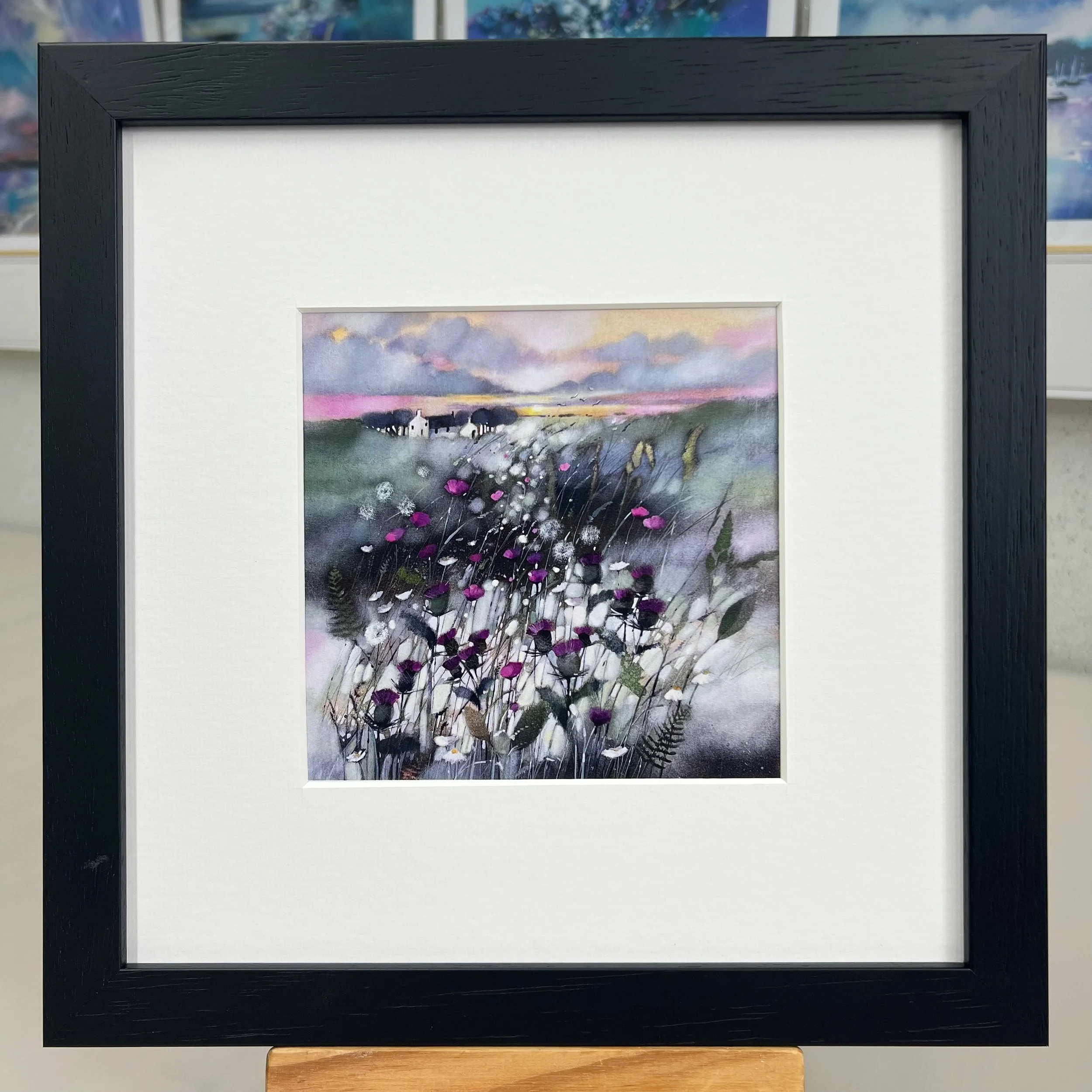 Framed Art Card The Thistle, Flower of Scotland by Scottish Landscape Artist Emma S Davis. Black Frame.