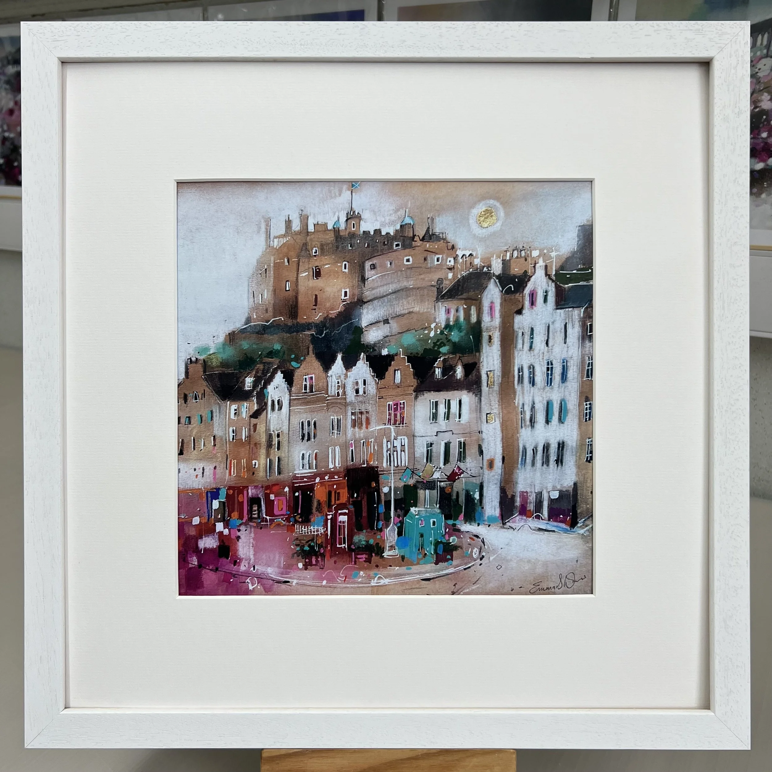 Moonlight Grassmarket Edinburgh art print featuring Edinburgh Castle overlooking the historic Grassmarket area of Edinburgh. Framed white option.