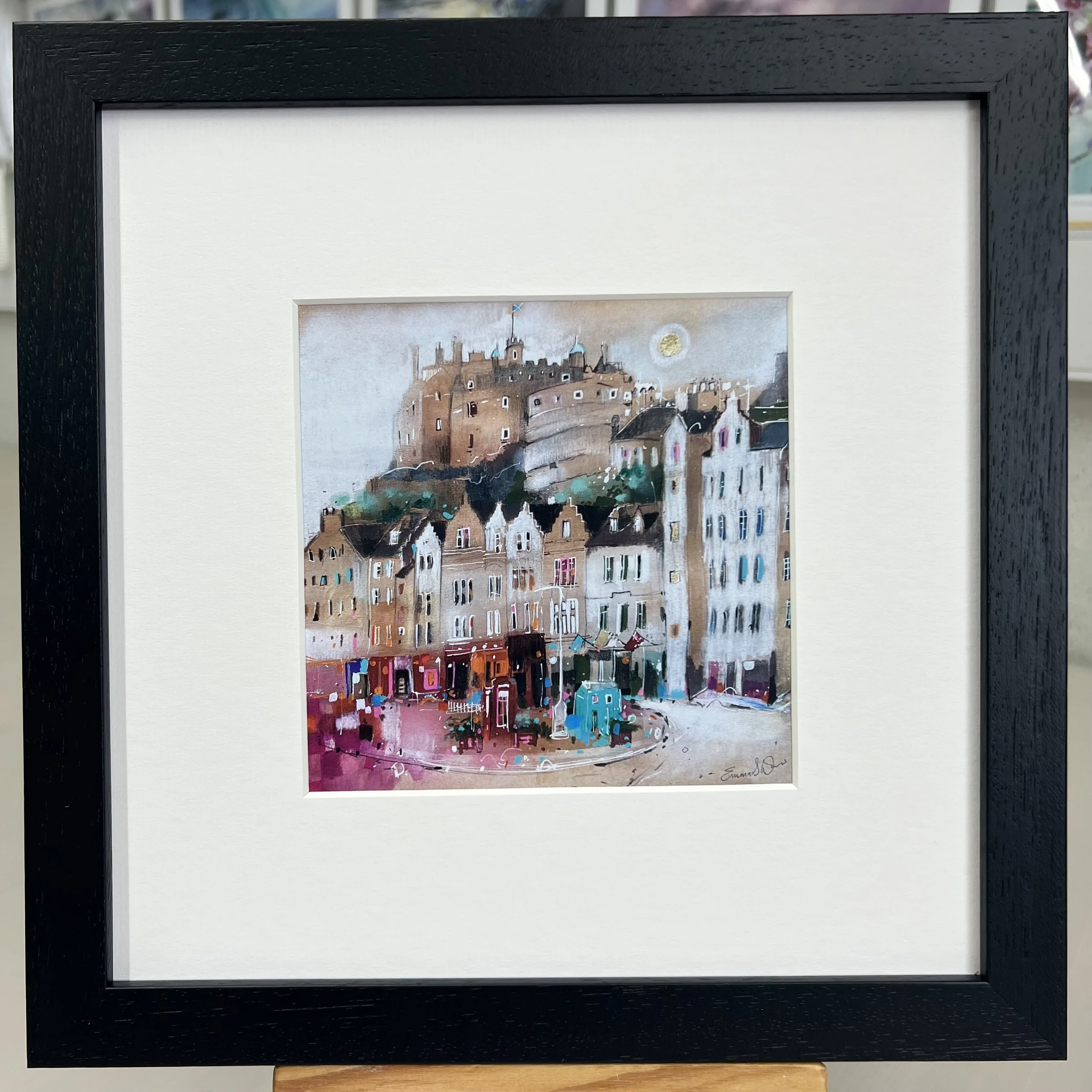 Moonlight Grassmarket Edinburgh framed art card featuring Edinburgh Castle overlooking the historic Grassmarket area of Edinburgh. Framed black single mount.