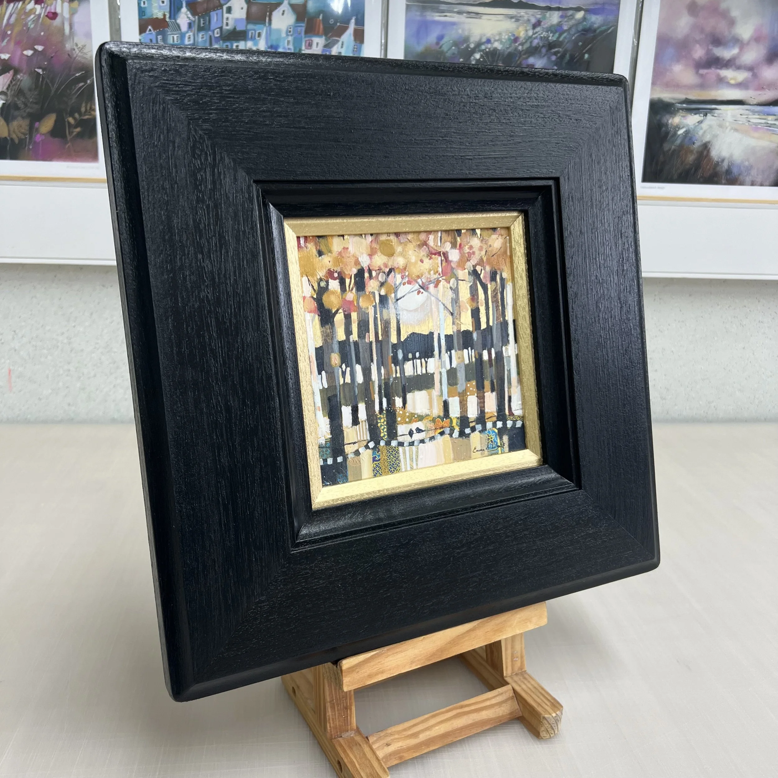 Original painting by Emma S Davis Artist shows 2 birds chattering on a fence amongst autumnal moonlit trees. Side view.