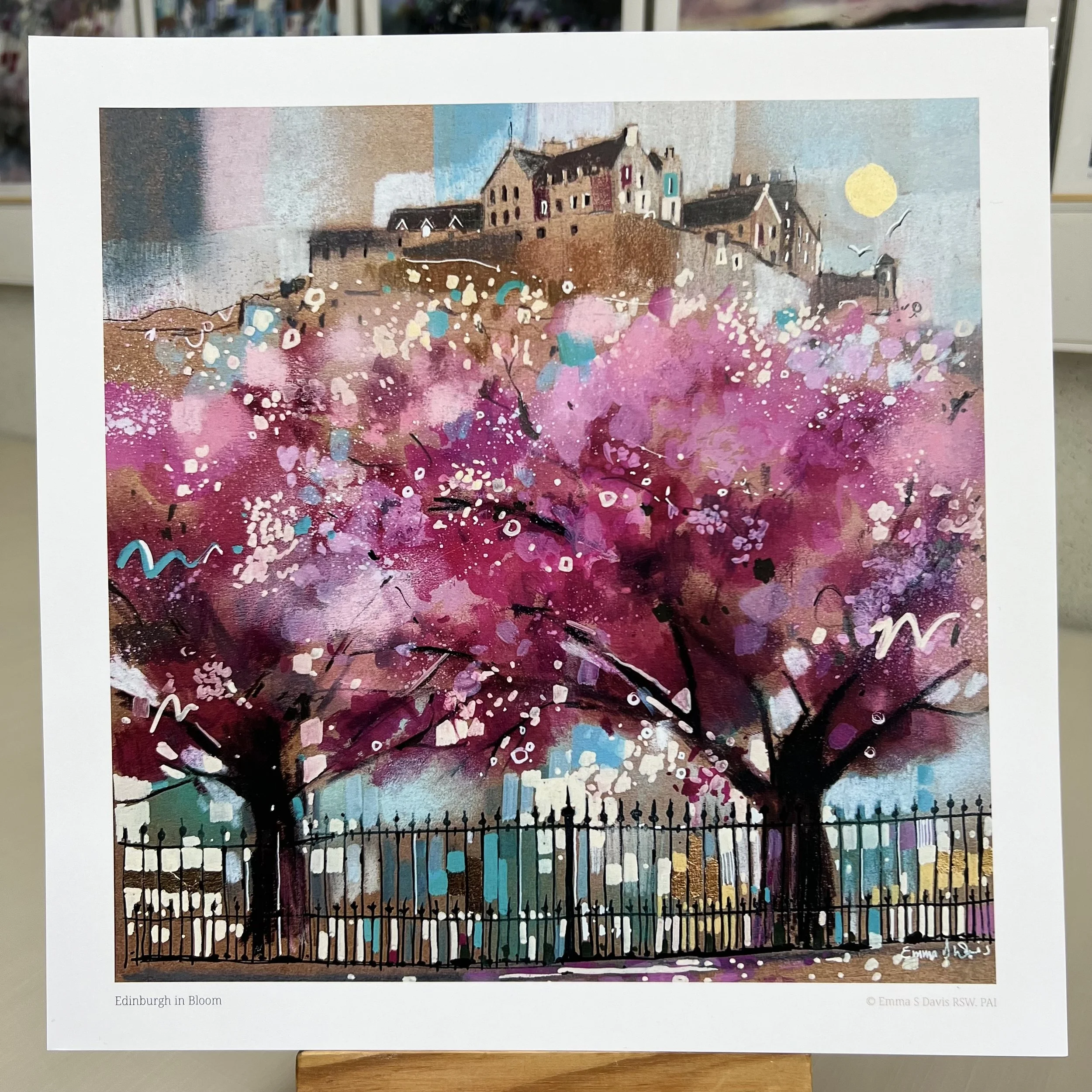 Edinburgh in Bloom artwork featuring Edinburgh Castle above blossom trees in Princes Street Gardens, Scotland. Unmounted option.