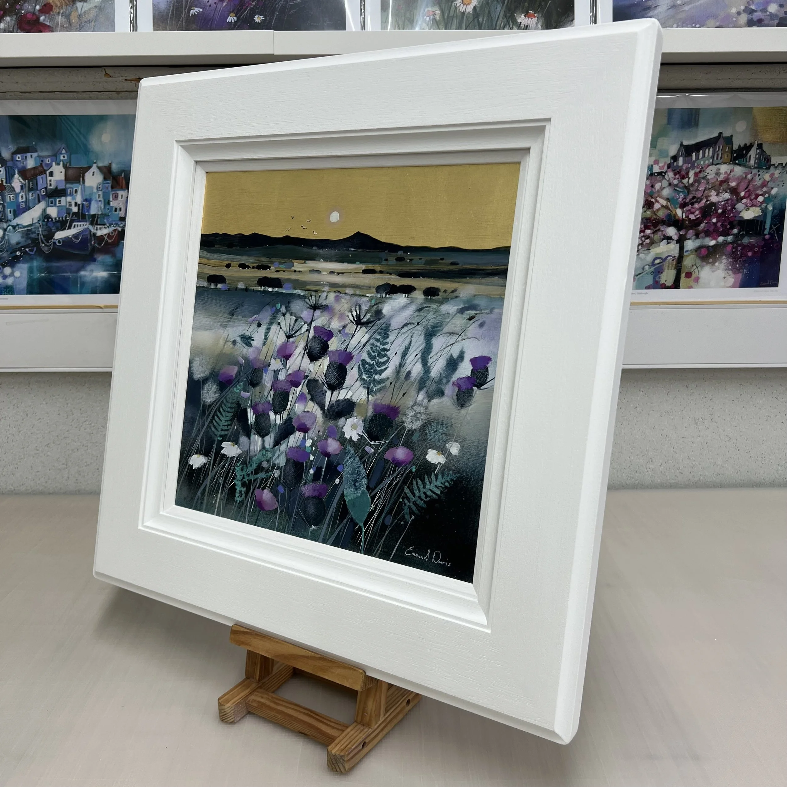 Bennachie at Moonlight original oil and gold leaf painting by Scottish artist Emma S Davis featuring Bennachie with wildflowers beneath a golden moonlit sky. Alternate view.