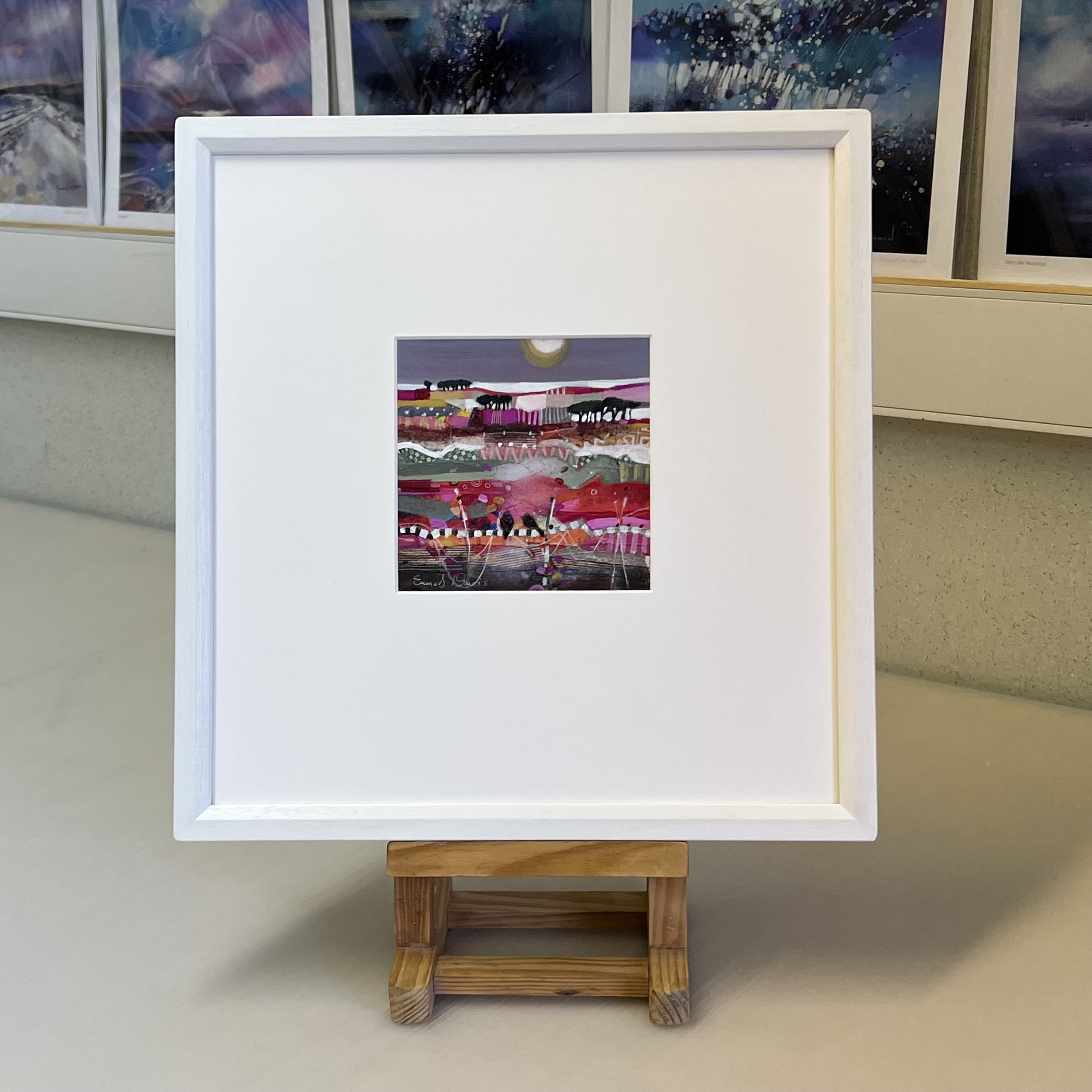 Colours of Autumn by Emma S Davis Artist, an abstract small framed original painting displaying fields of autumnal colours under a moonlit sky.