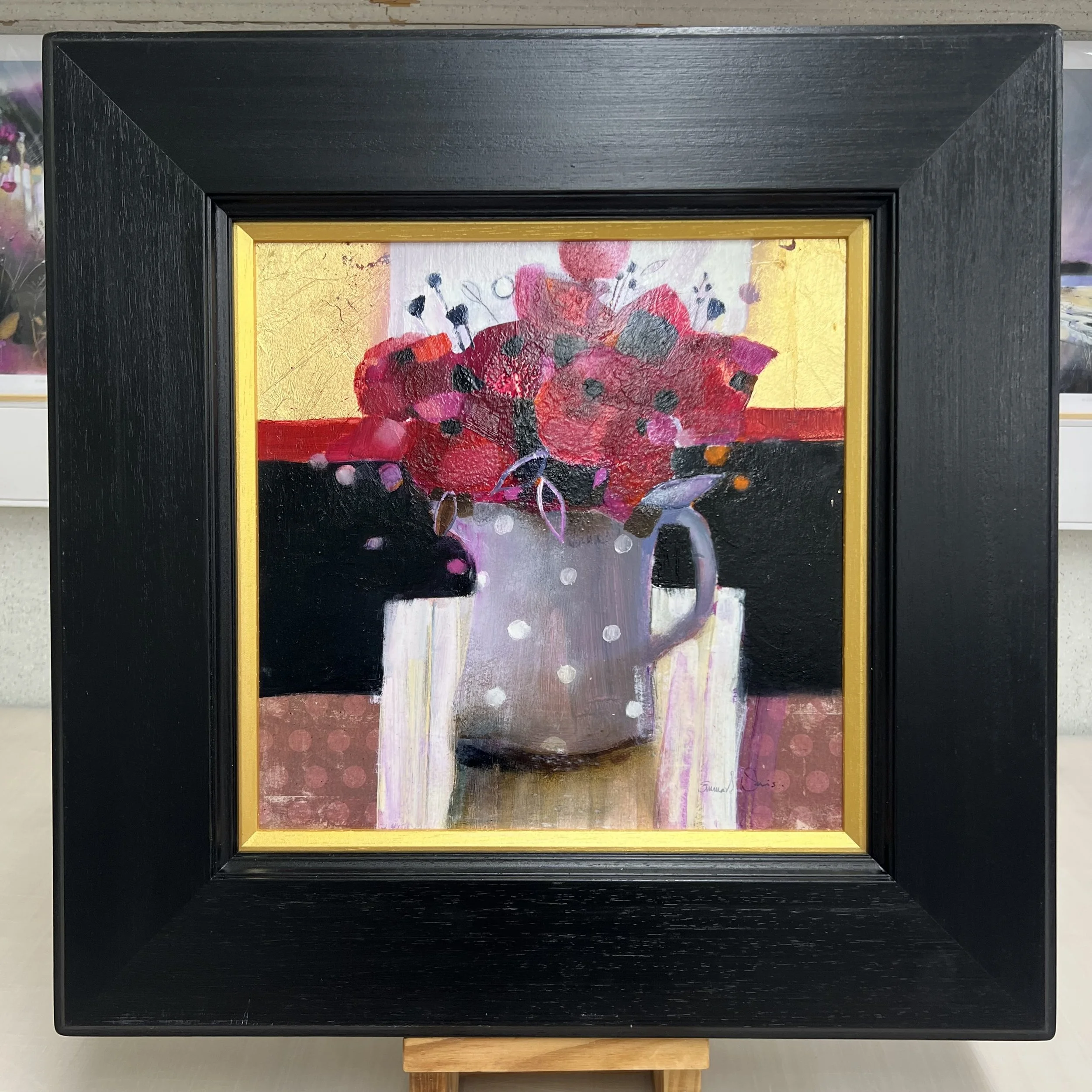 Poppies and Gold original oil and gold leaf floral painting by Scottish artist Emma S Davis featuring vibrant red poppies against a gold leaf background. Framed view.