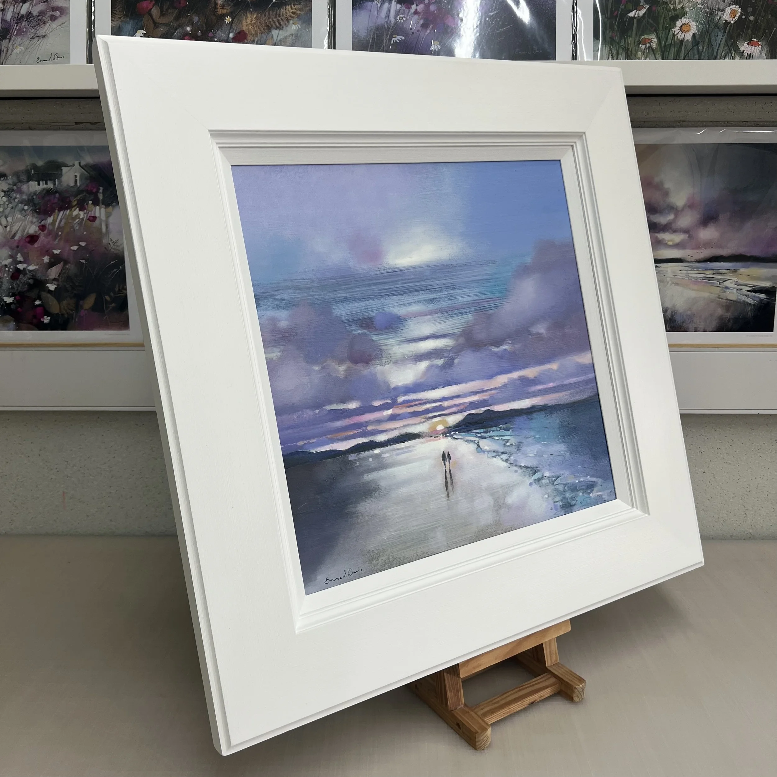 Original oil painting of a couple walking along Luskentyre Beach on the Isle of Harris in the Outer Hebrides at sunset by Scottish artist Emma S Davis. Side view.