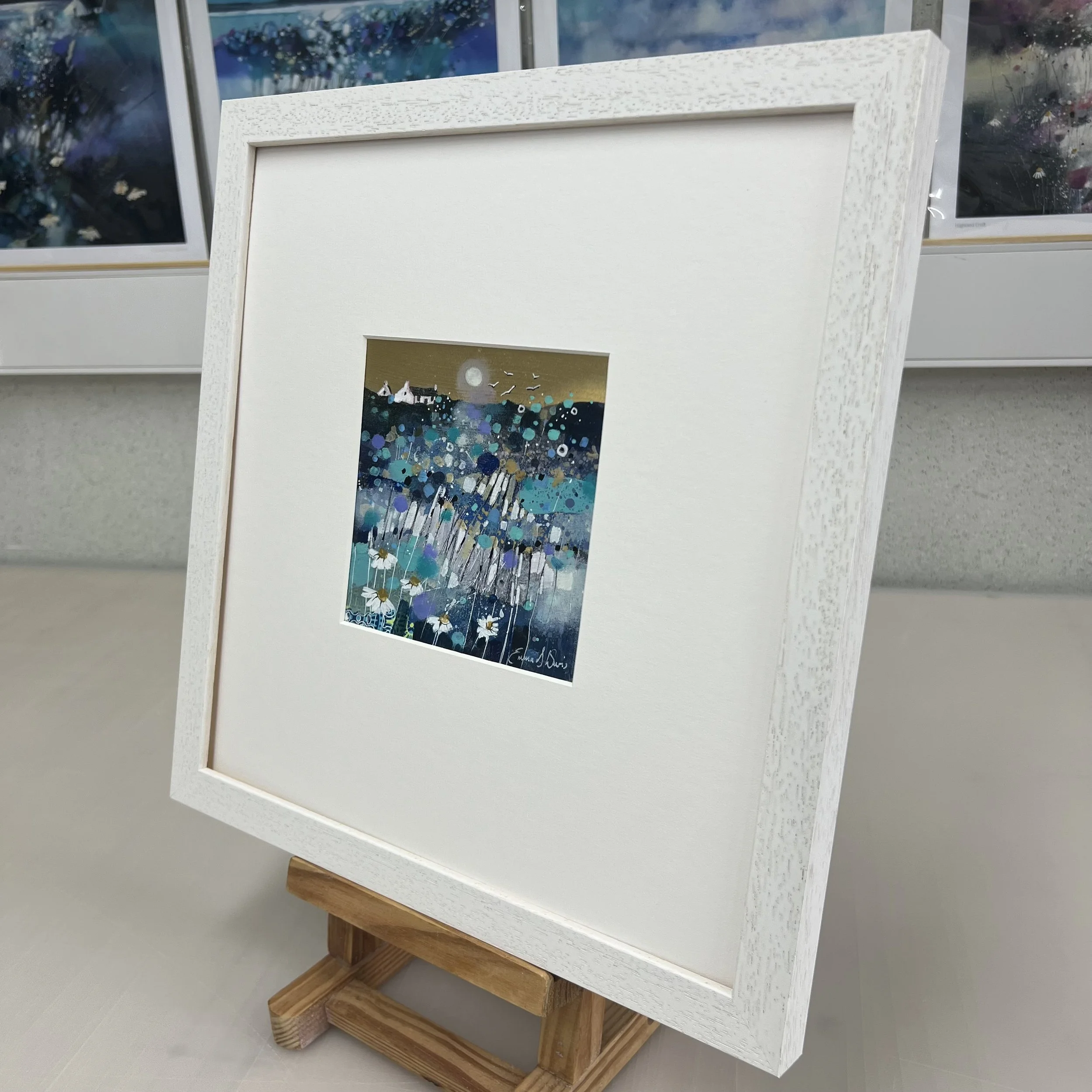 Colourful wildflowers lit up by the golden moonlit sky in this original oil landscape framed painting by Emma S Davis Artist side view
