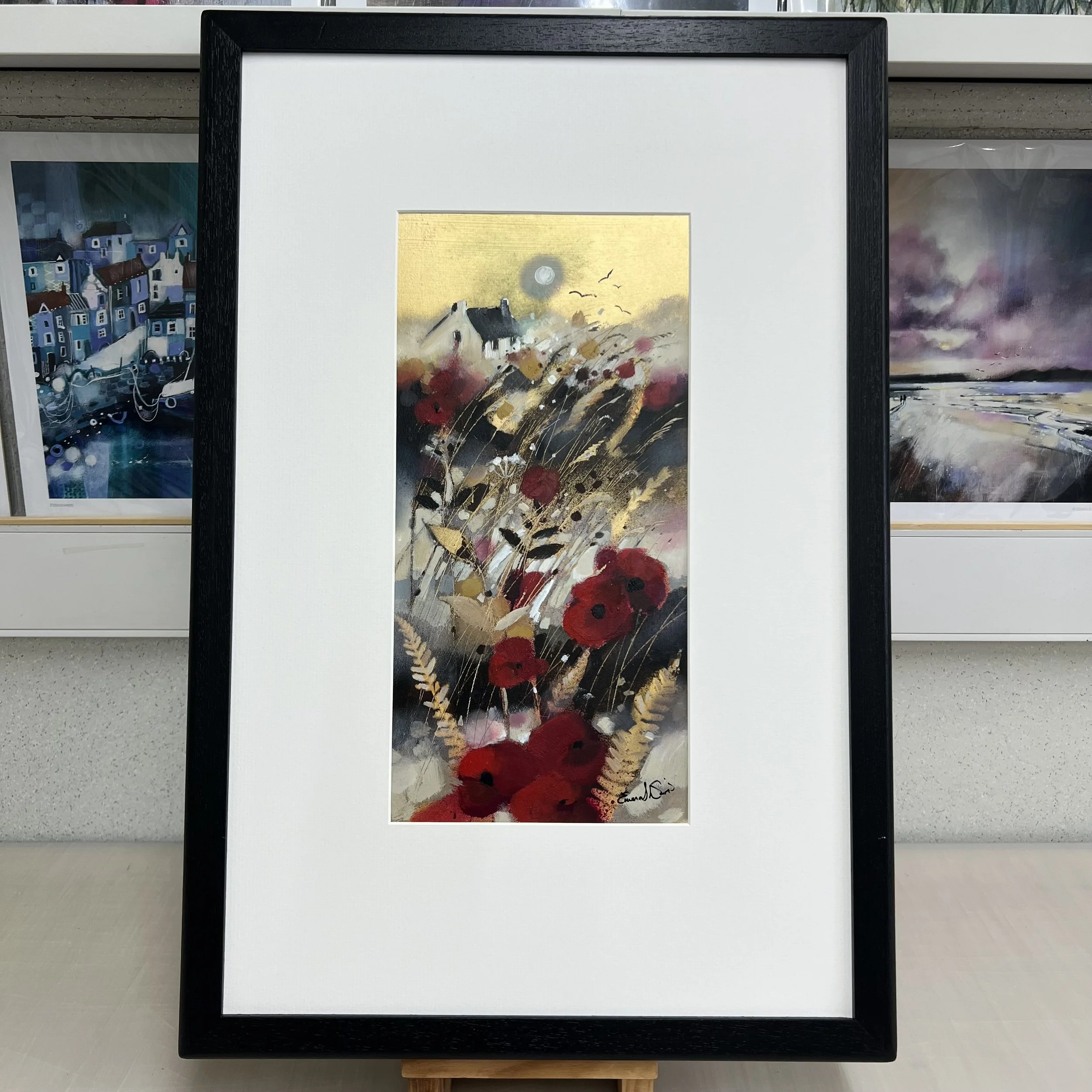 Framed original painting Fly Me to the Moon showing a countryside cottage beneath a glowing moon