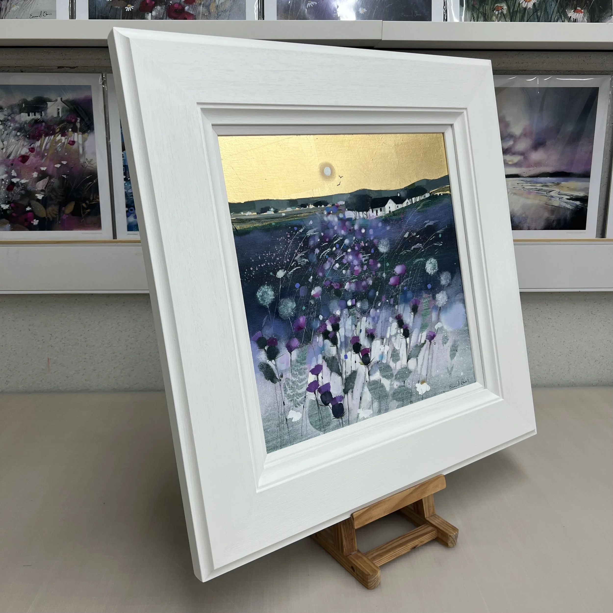 Original oil painting with gold leaf of Highland crofts, purple thistles, wildflowers and dandelion clocks in the Scottish Highlands by Scottish artist Emma S Davis. Side view.