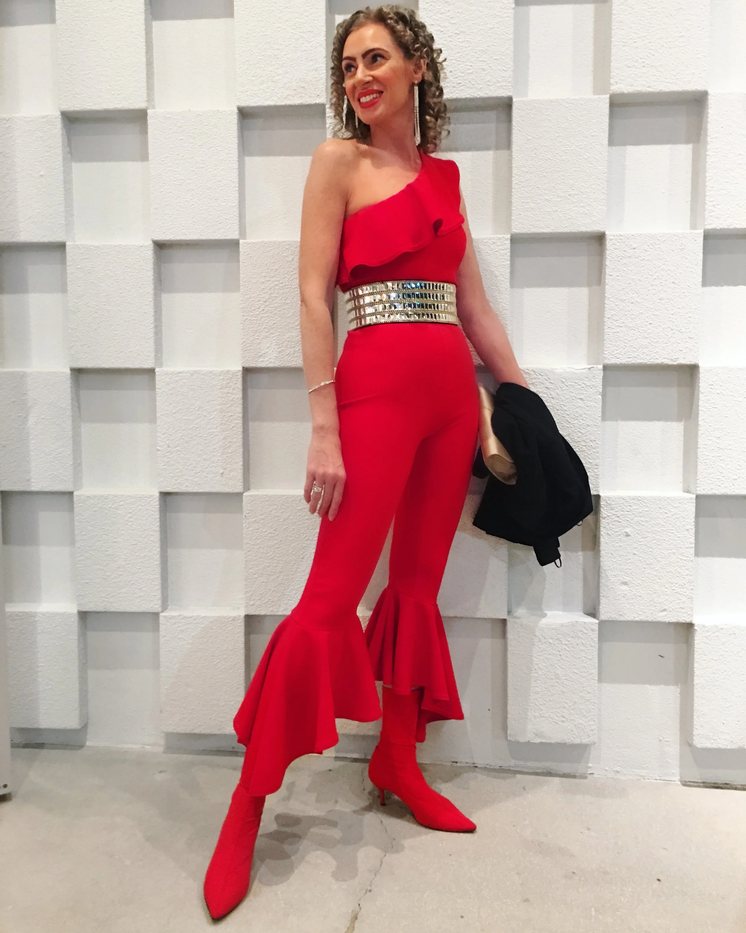 One-shoulder jumpsuit and belt by Pretty Little Thing with Zara Boots at Shore, St Armand's