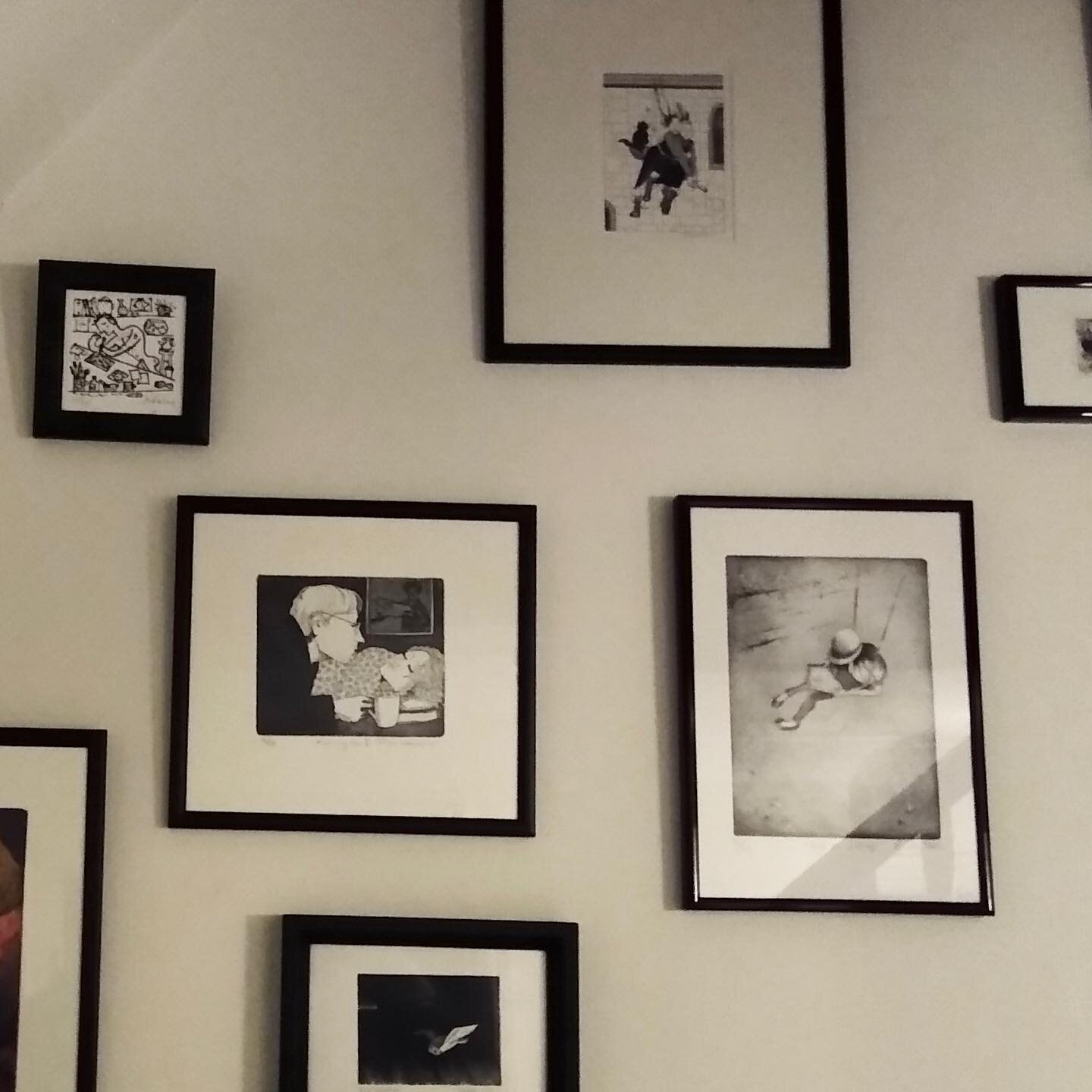Always lovely to see my prints in their homes... &lsquo;Girl on Swing&rsquo; is in good company next to works by #franswesselman and #jillmurphy in this photo sent recently by a collector. Love the theme and feel of the stairwell gallery of black and