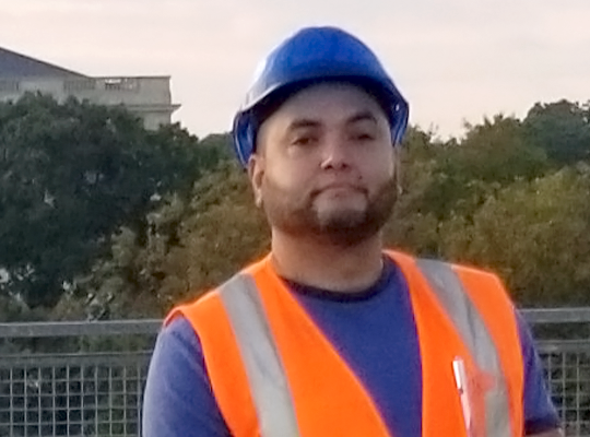 headshot of Pedro Rodriguez on roof