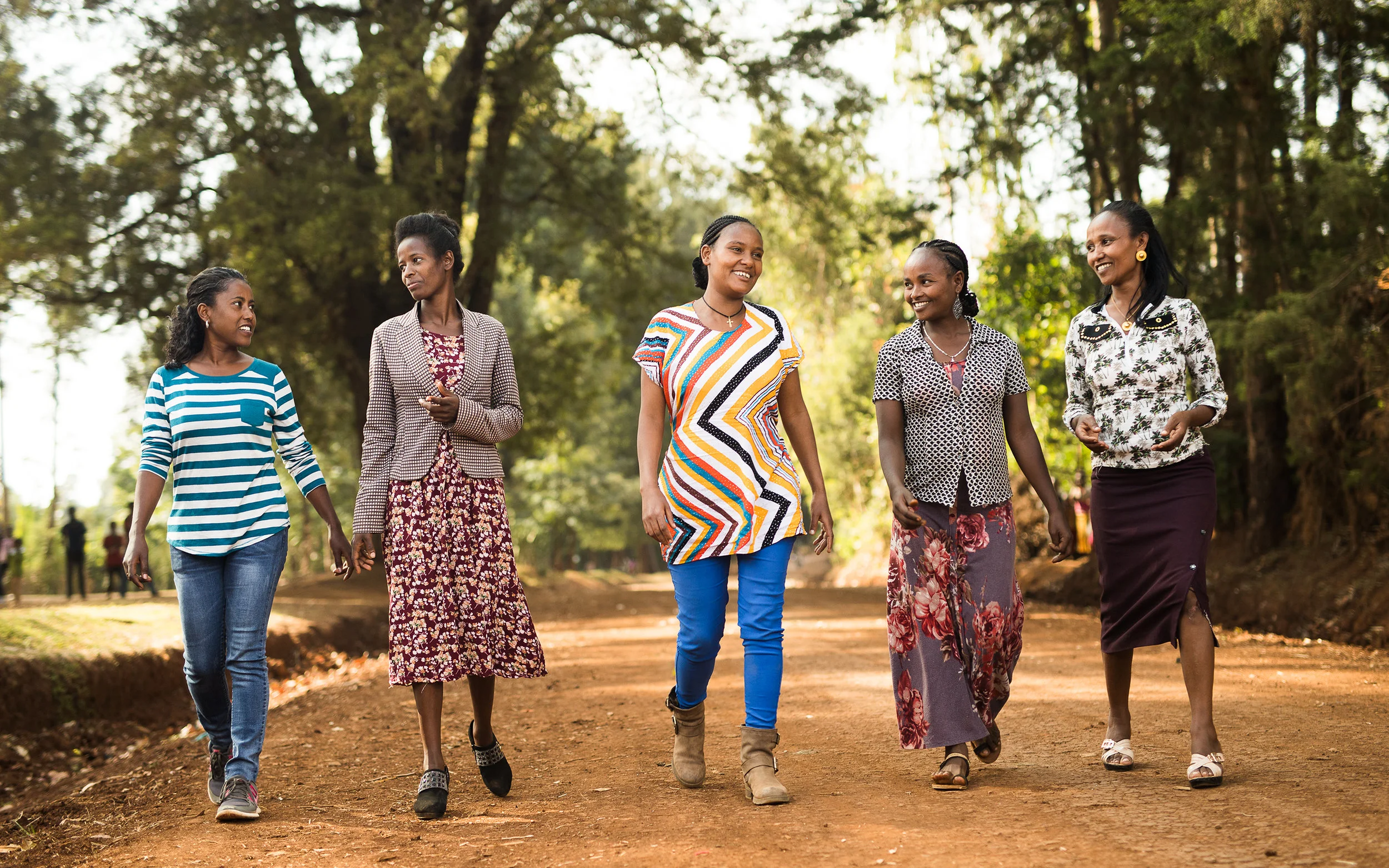 Abinet Dulume, Meseret Kanto, Adanech Tumsido, Aynalem Mutega and Abinet Cebude, all Technoserve agronomists on their way to work. The five ladies are very experienced in coffee production and teach farmers new techniques.