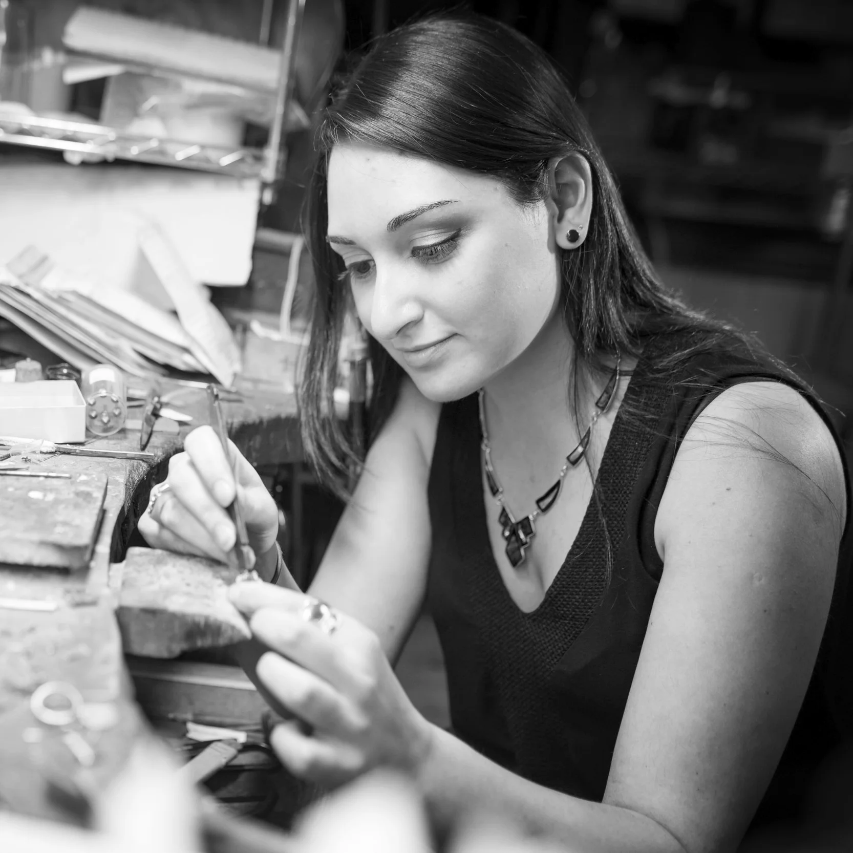 Ana Tkabladze, Manager Originally from Georgia (the country, not the state), Ana moved to Virginia as a child and has lived in the DC region ever since. As the daughter of two accomplished artists, Ana grew up surrounded by an array of creative outlets but she was drawn to the craft of jewelry making at a young age. Now a full-blown "obsessive addict", she has studied enameling, metalsmithing, and works with our CAD software for jewelry design. Ana travels extensively (when she can) and will bring you delicious Georgian food (if you ask nicely).