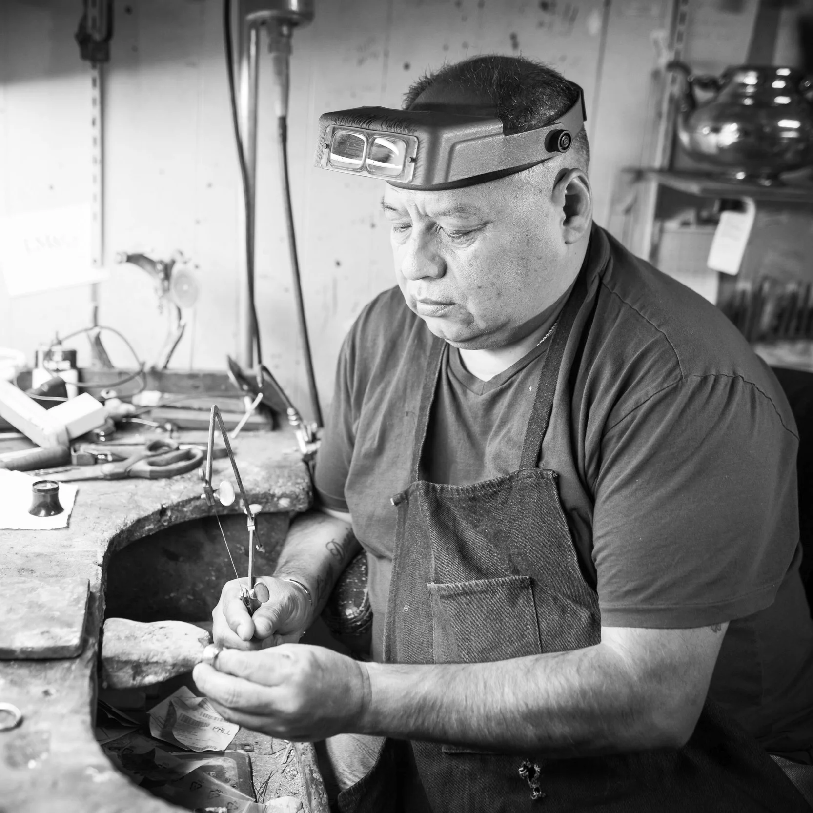 Ricardo Covarrubius, Expert Goldsmith Ricardo has been with our shop for over a decade and is one of the most knowledgeable resources around for goldsmithing and fine jewelry repair. He hails from Bolivia and learned his craft from his father, who lived his life as a goldsmith in Cochabamba after learning from his own father before him. Ricardo's skill at the bench is unmatched, and he often perfects pieces that have been rejected (or ruined) by other, less experienced jewelers. He lives in Alexandria with his family and tries to get back to Cochabamba about once a year.