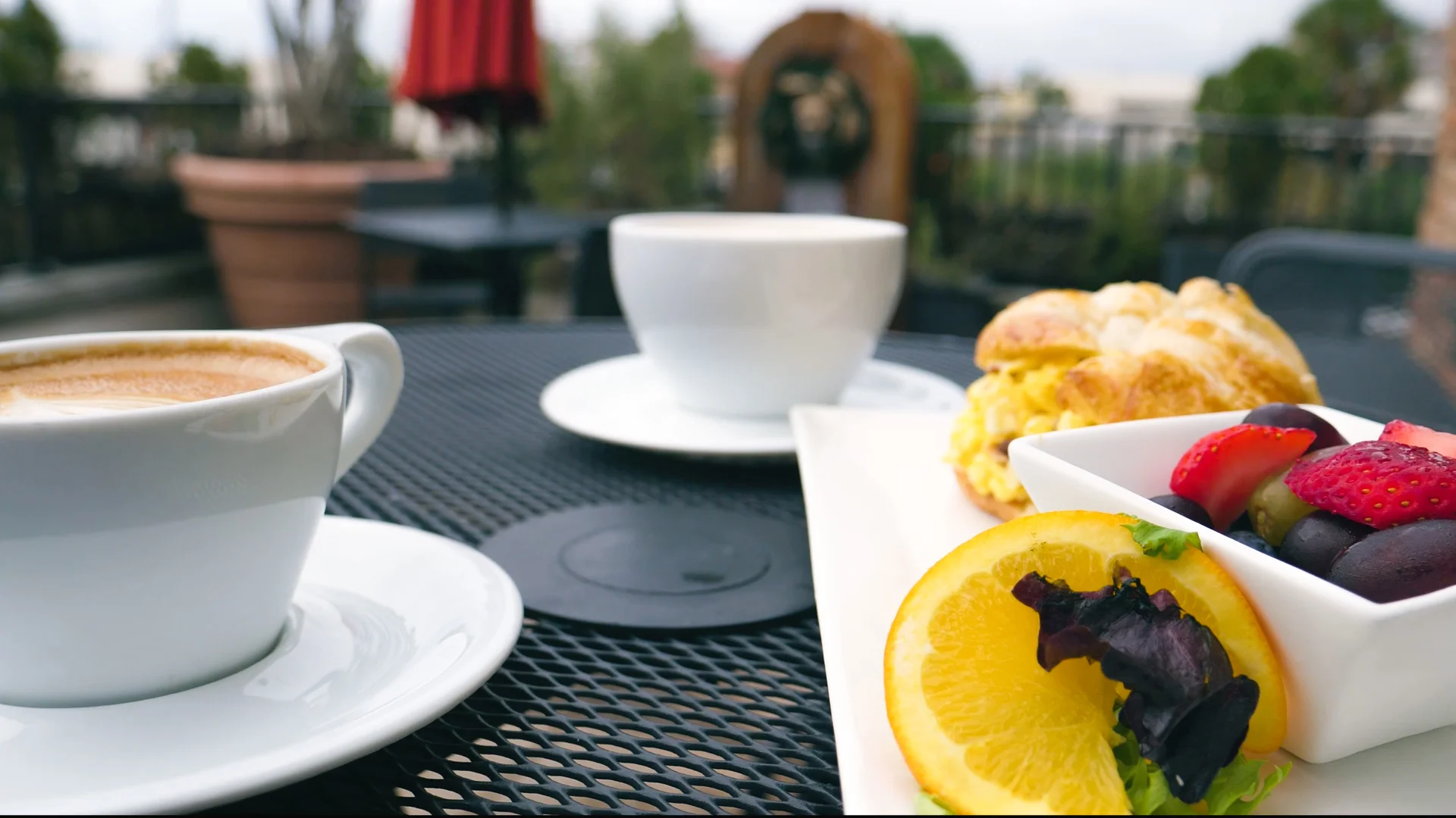 Coffee and breakfast on a rooftop at Bodacious Brew on Palafox Place - just one of many options for your morning in downtown Pensacola!
