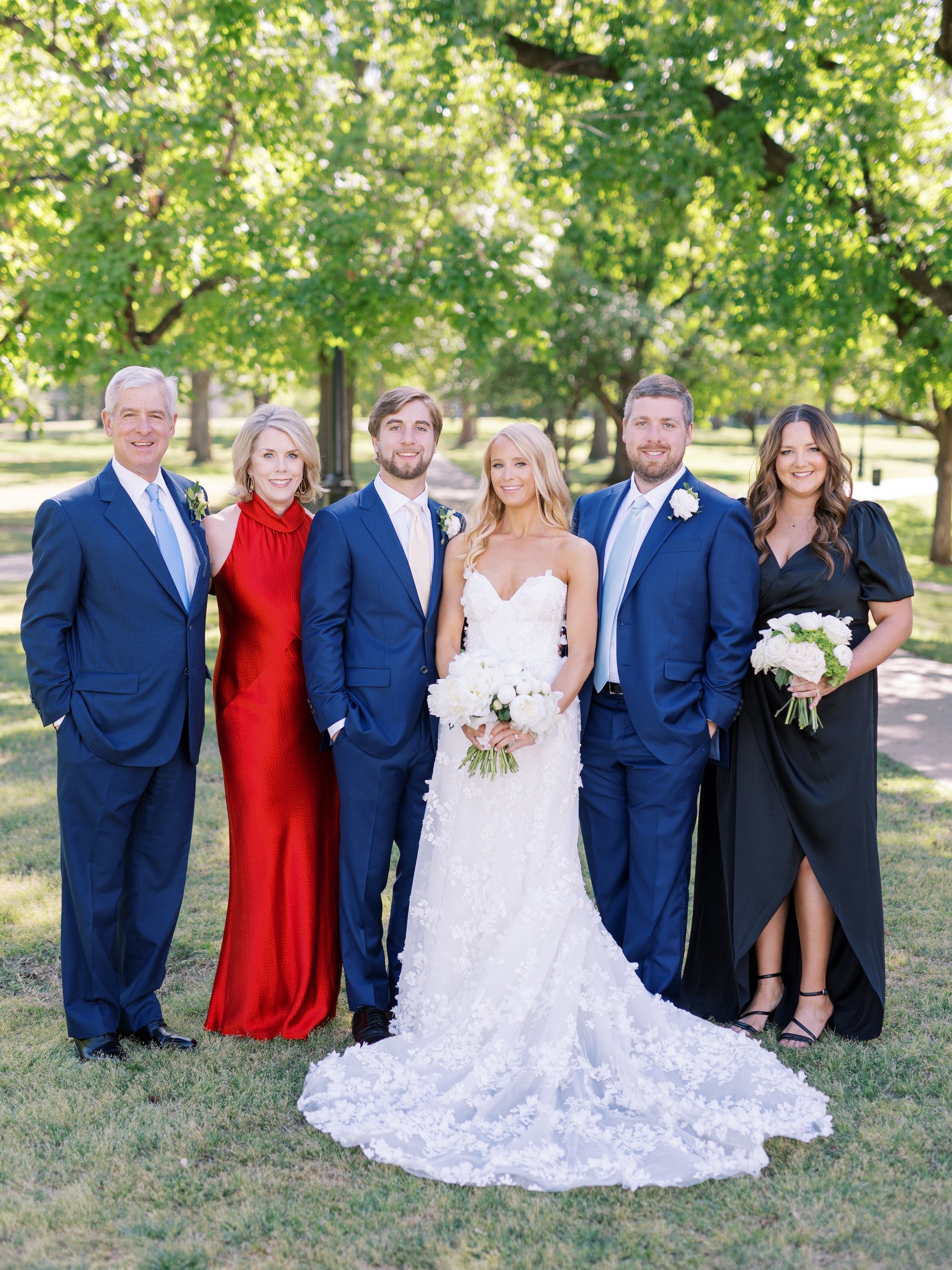 the groom's family with the gorgeous couple