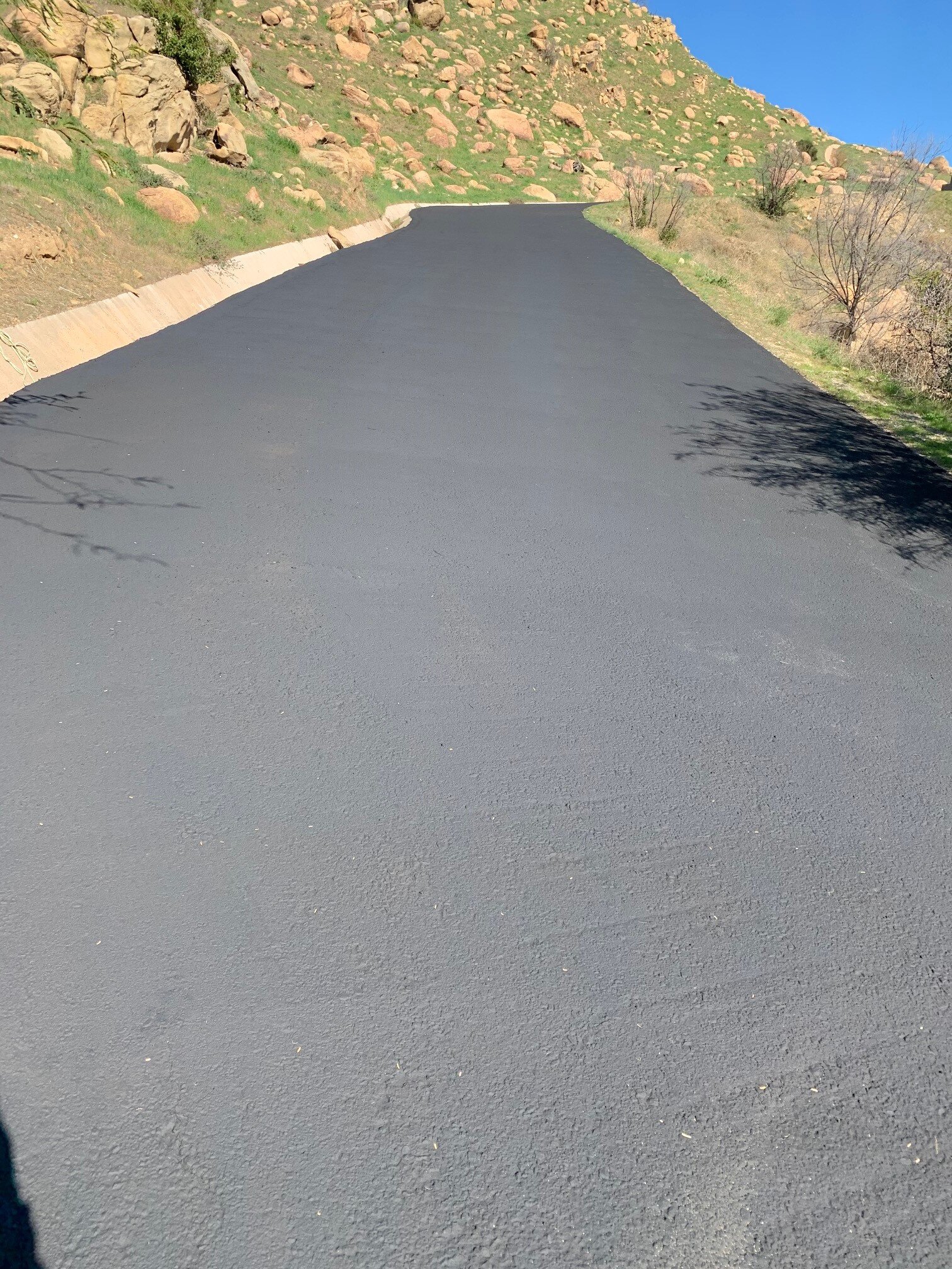 Asphalt patch and masterseal seal coat-view from the bottom