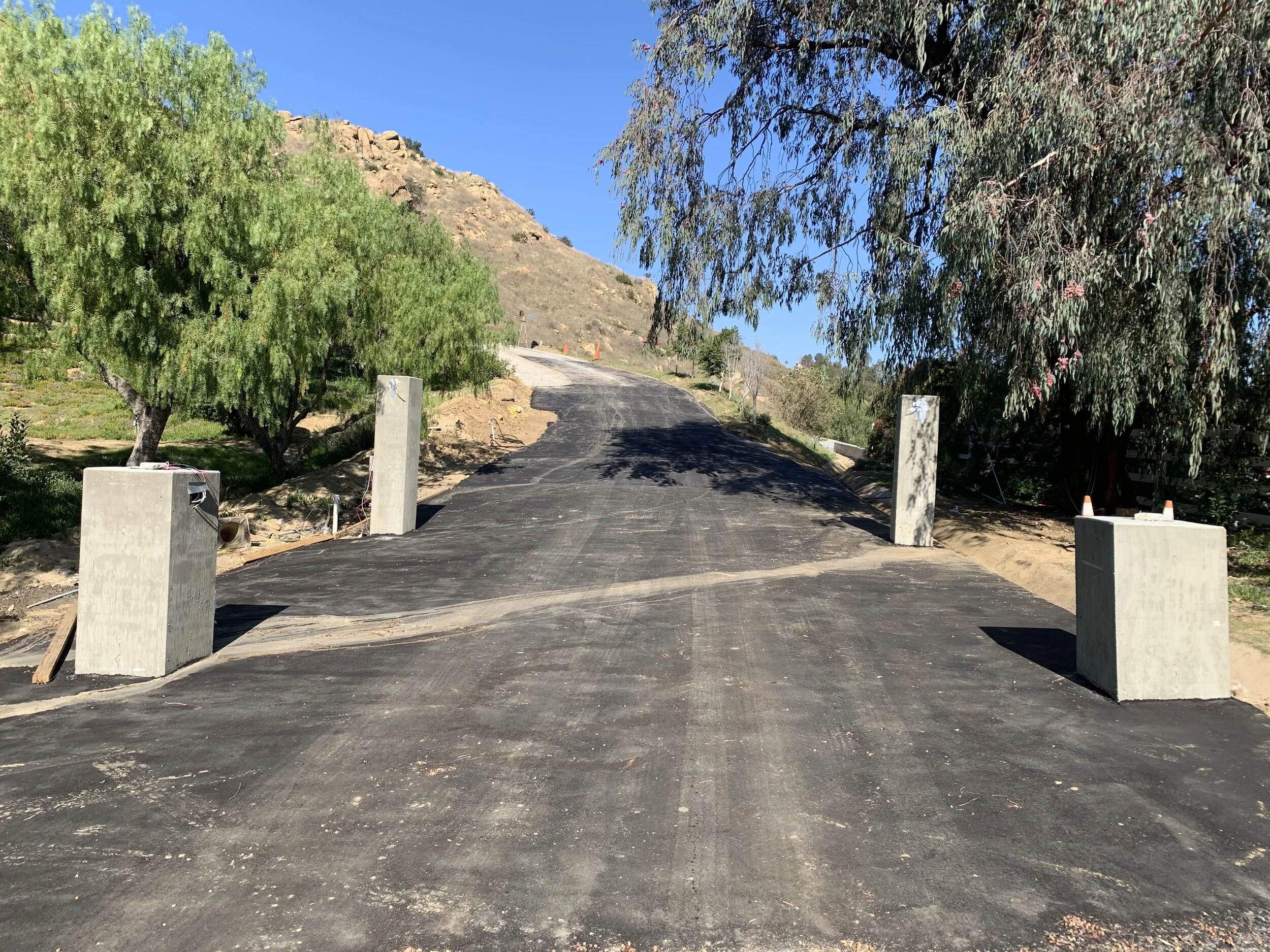 Asphalt patch at trench and asphalt overlay