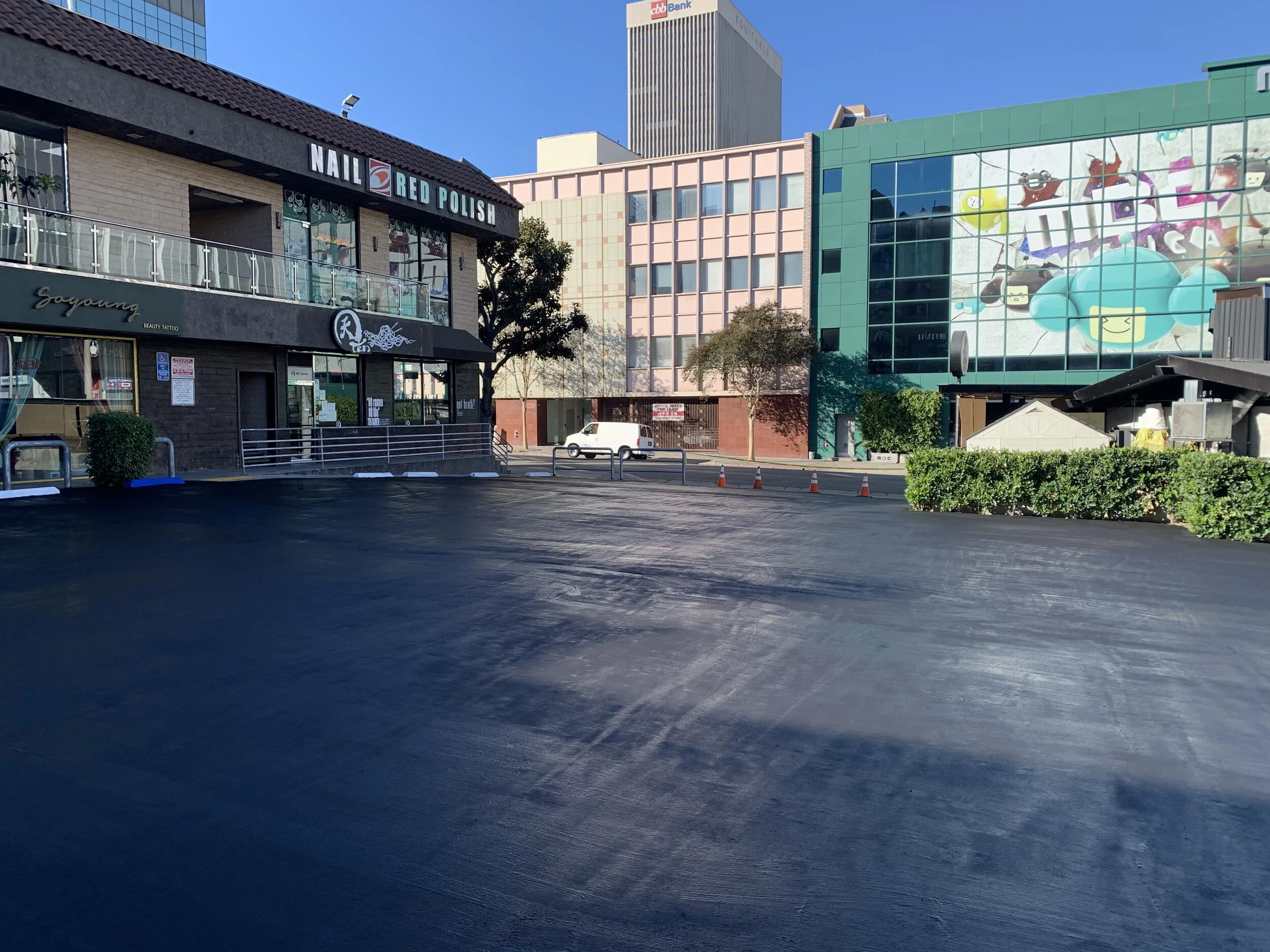 Dutch Dynasty Construction 33rd ST Sealcoat Entrance 1.JPG