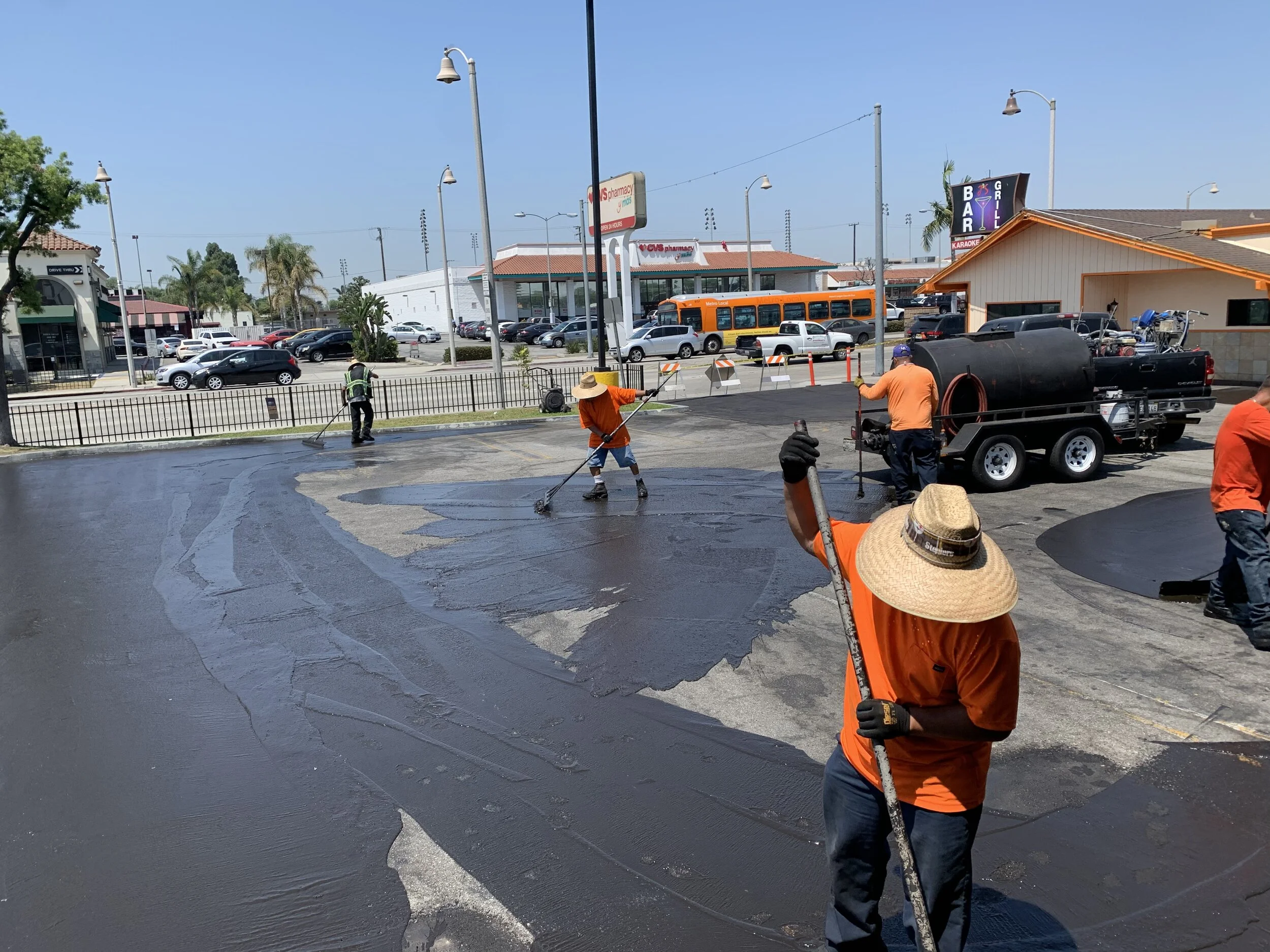 Dutch Dynasty Construction Parking Sealcoat application.JPG
