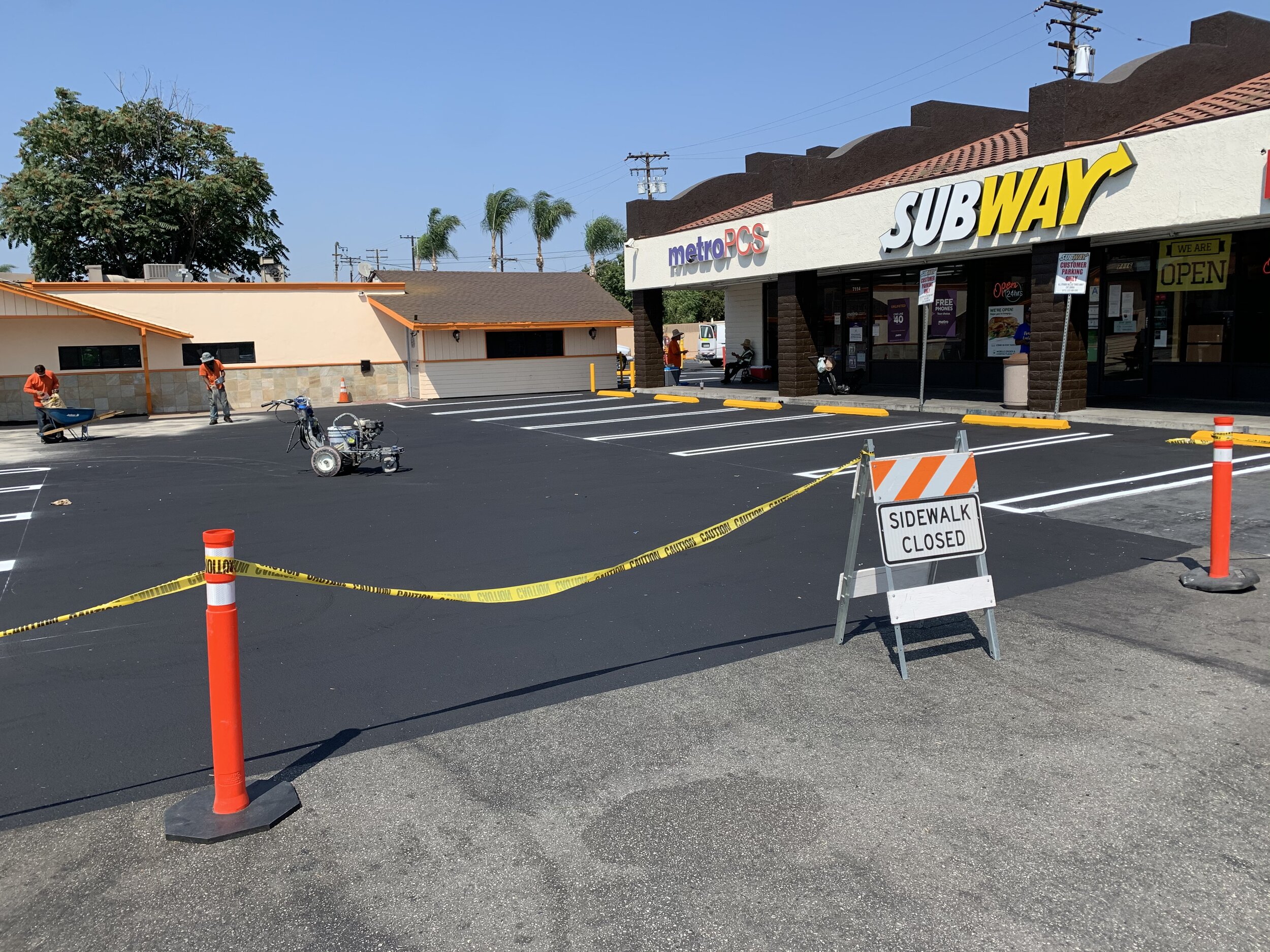 Dutch Dynasty Construction Parking Sealcoat traffic control.JPG