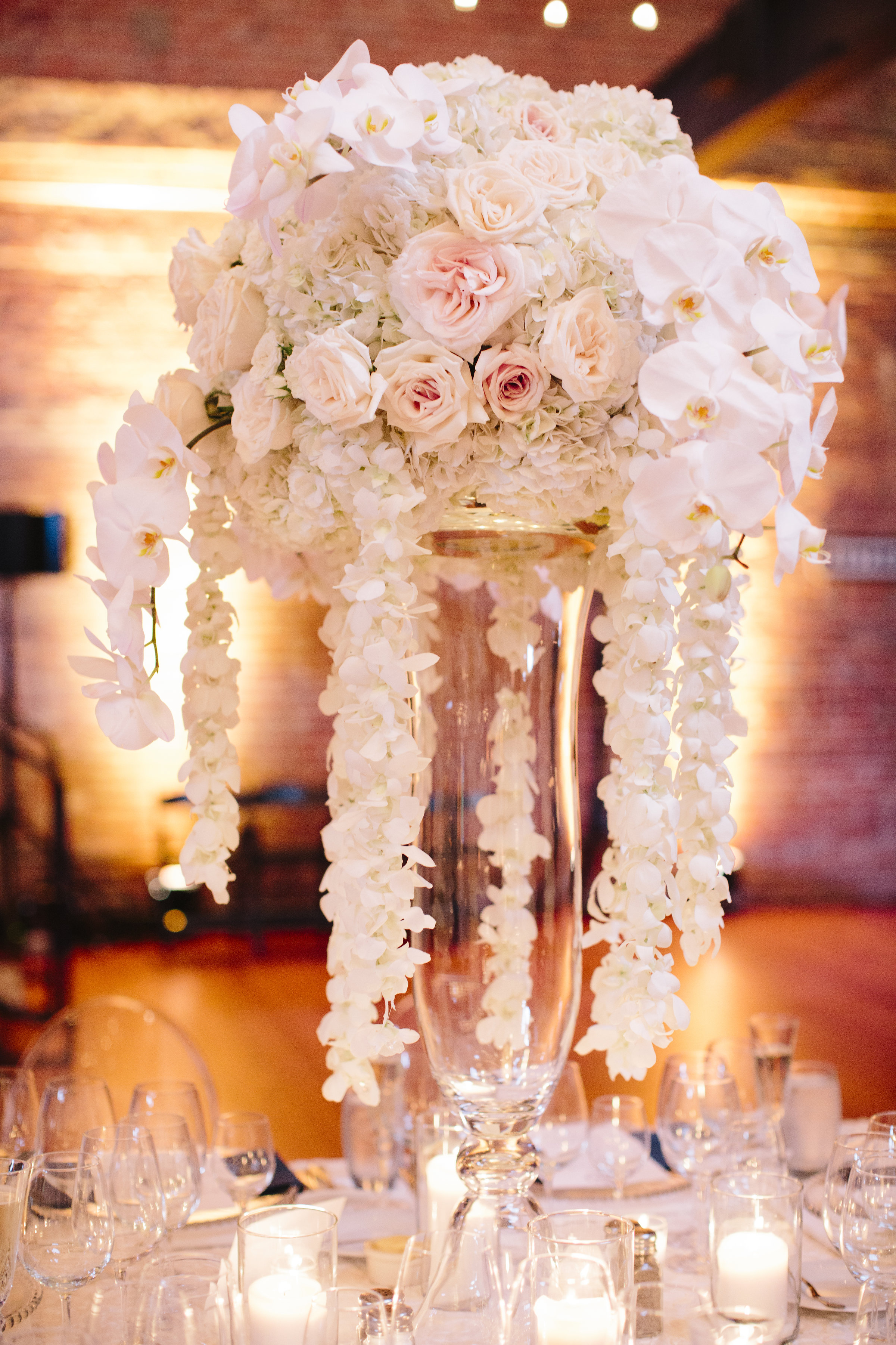 Pink and white rose cascade wedding centerpiece