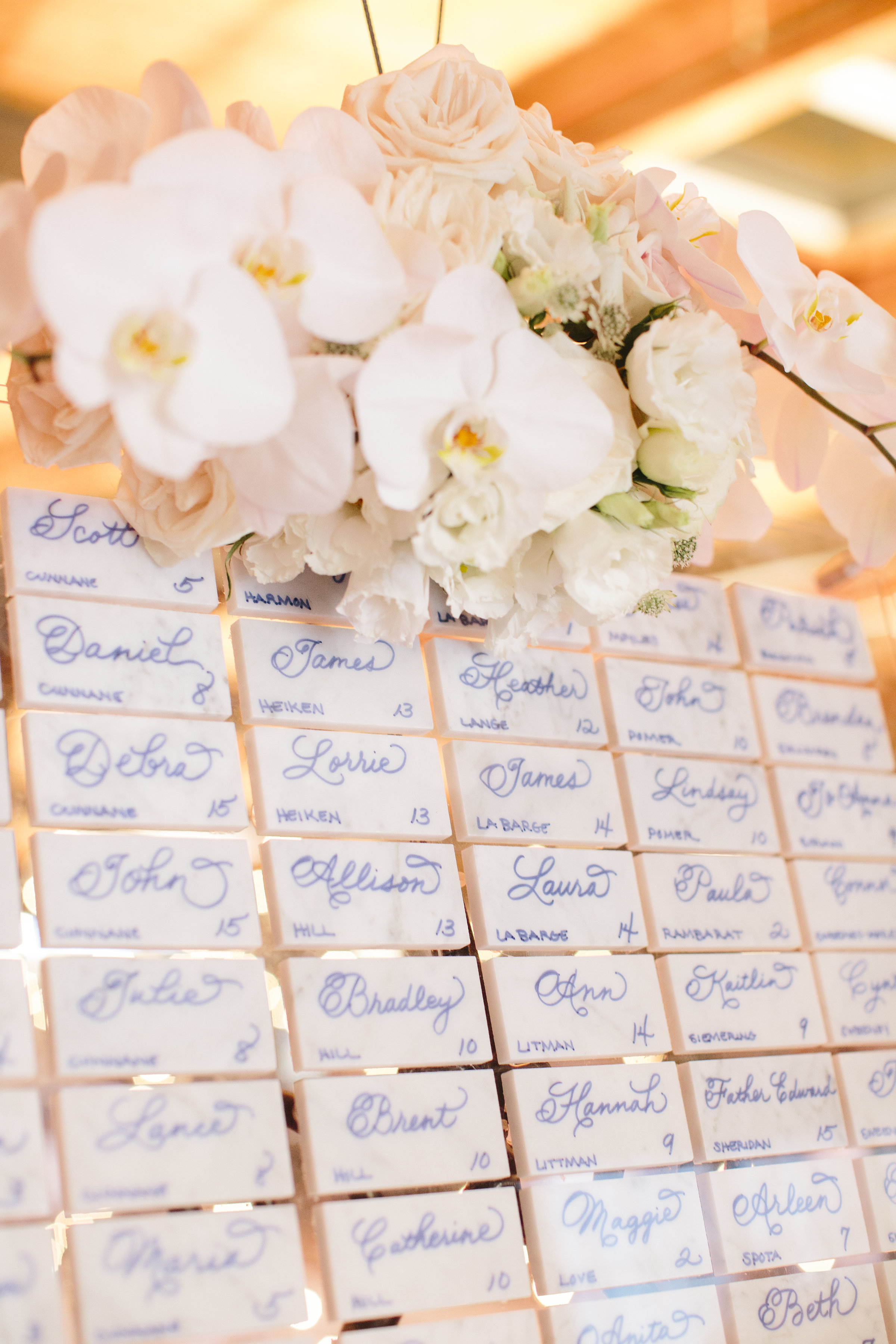 Wedding escort cards under glass