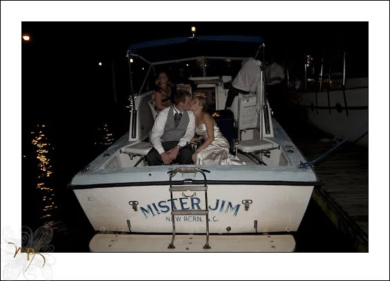 bride-and-groom-leave-by-boat.jpg