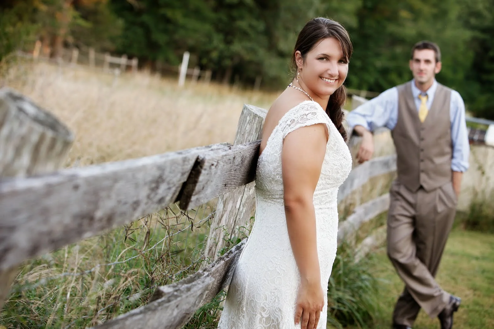 bride2band2bgroom2bportrait2bfence1.jpg