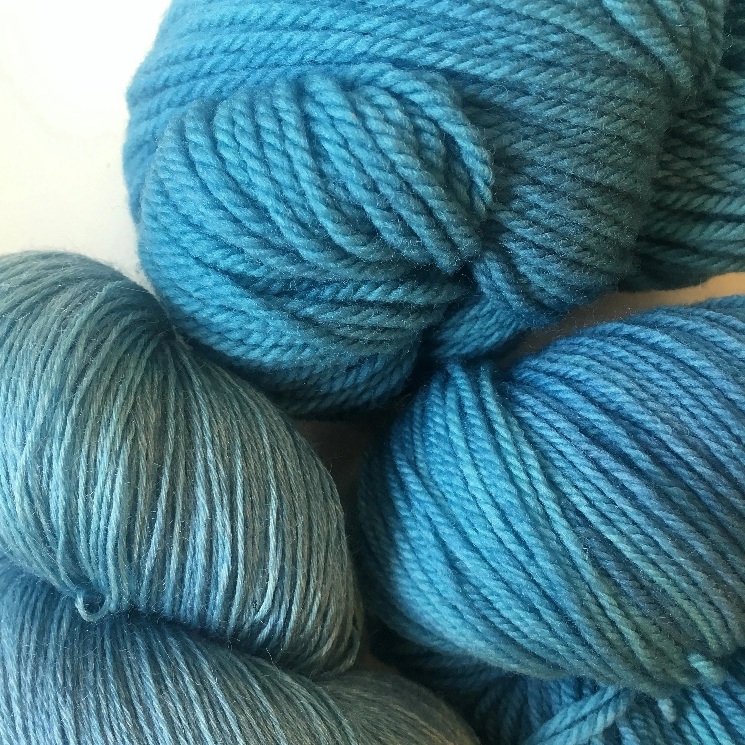 Pictured on Aura Lace, Targhee Sock, and Targhee Worsted