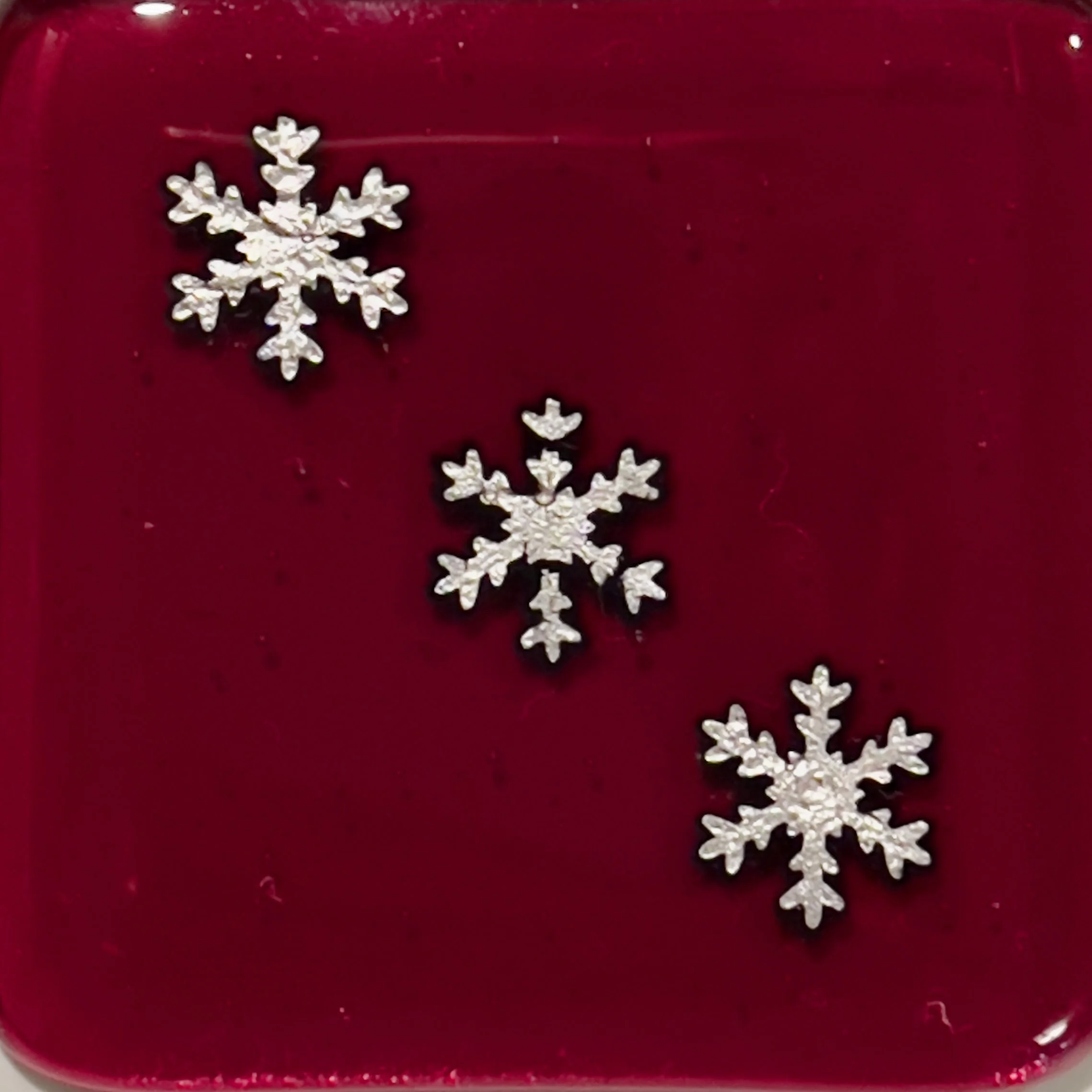 Suncatcher-2x2-RedSilverSnowflakes-Nov2025.jpg