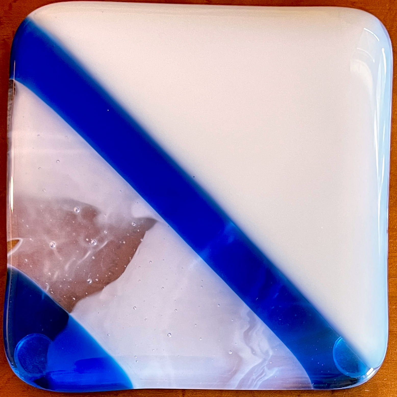 Coaster-4-CascadeWhiteTrueBlue-April2026.png