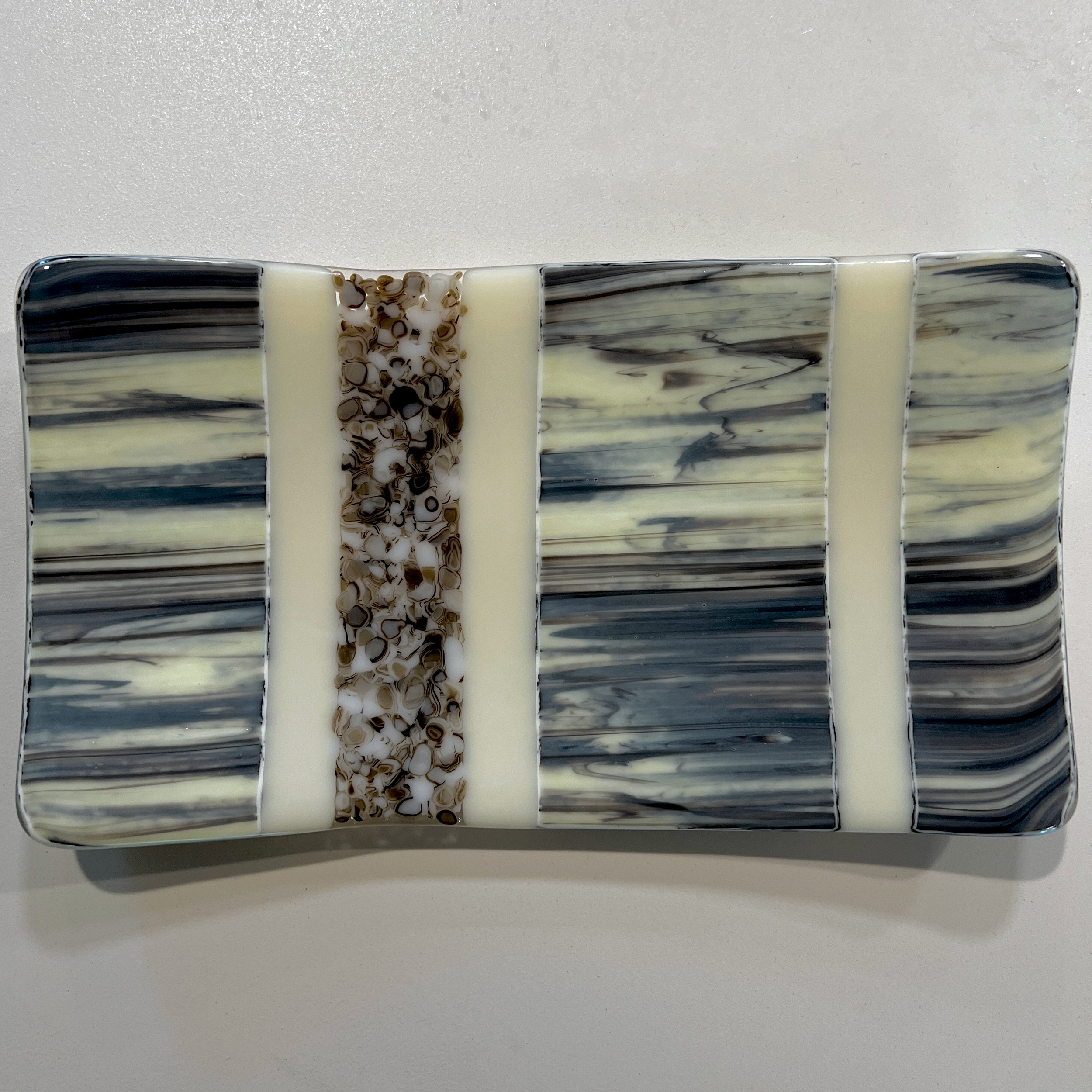 MedTray-10x6-GrayWoodGrainBrownPebblesFVStripes-April2026.png