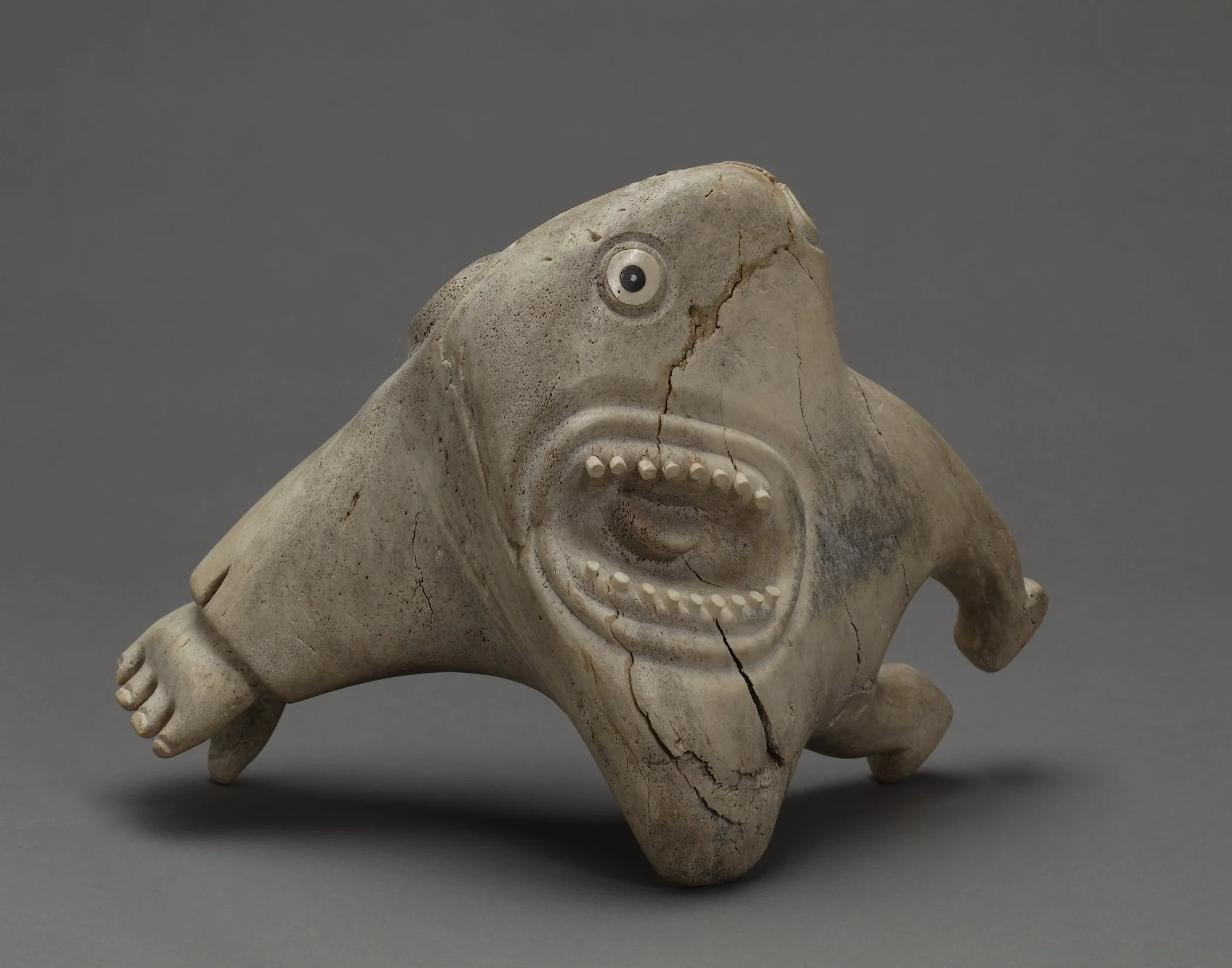 Karoo Ashevak, Canadian (Inuit), 1940–1974, Untitled (Shaman) , about 1970–74. Carved whalebone inlaid with walrus ivory, baleen, and stone, height: approx. 7 in. Hood Museum of Art, Dartmouth College: Bequest of Evelyn Stefansson Nef; 2011.25.2.