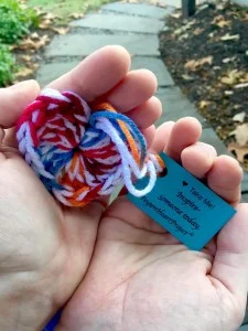 Yarn hearts that will be made by Knit Wits this semester. Photo Courtesy of http://www.thepeytonheartproject.org/